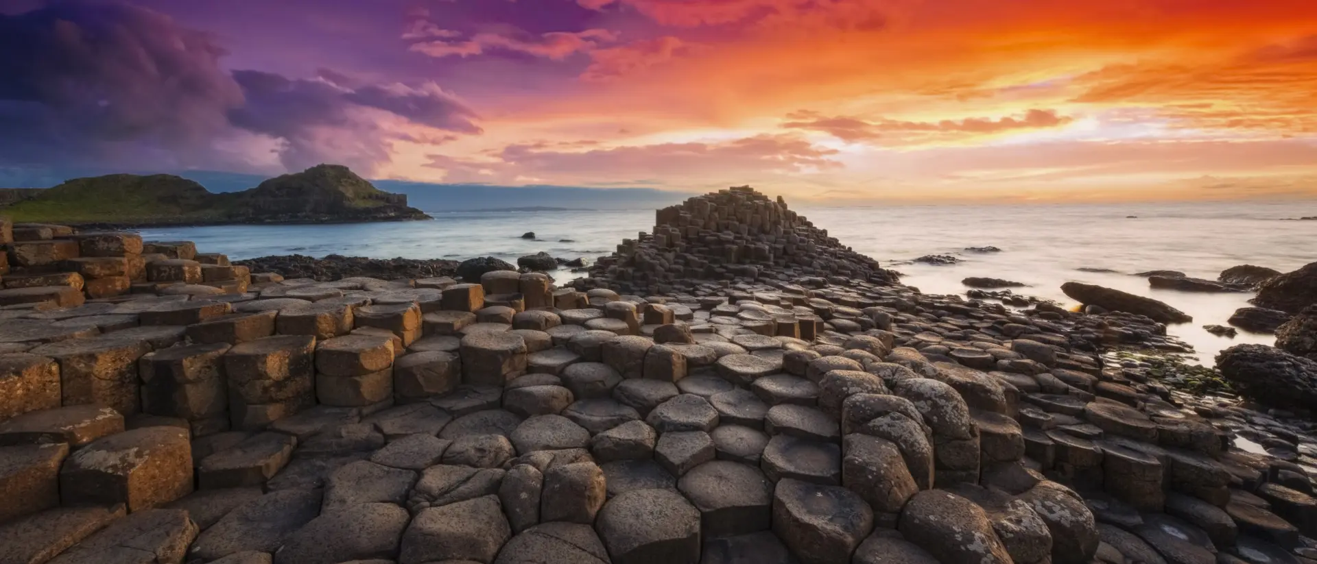 Colourful sunset at the Giant's Causeway Northern Ireland