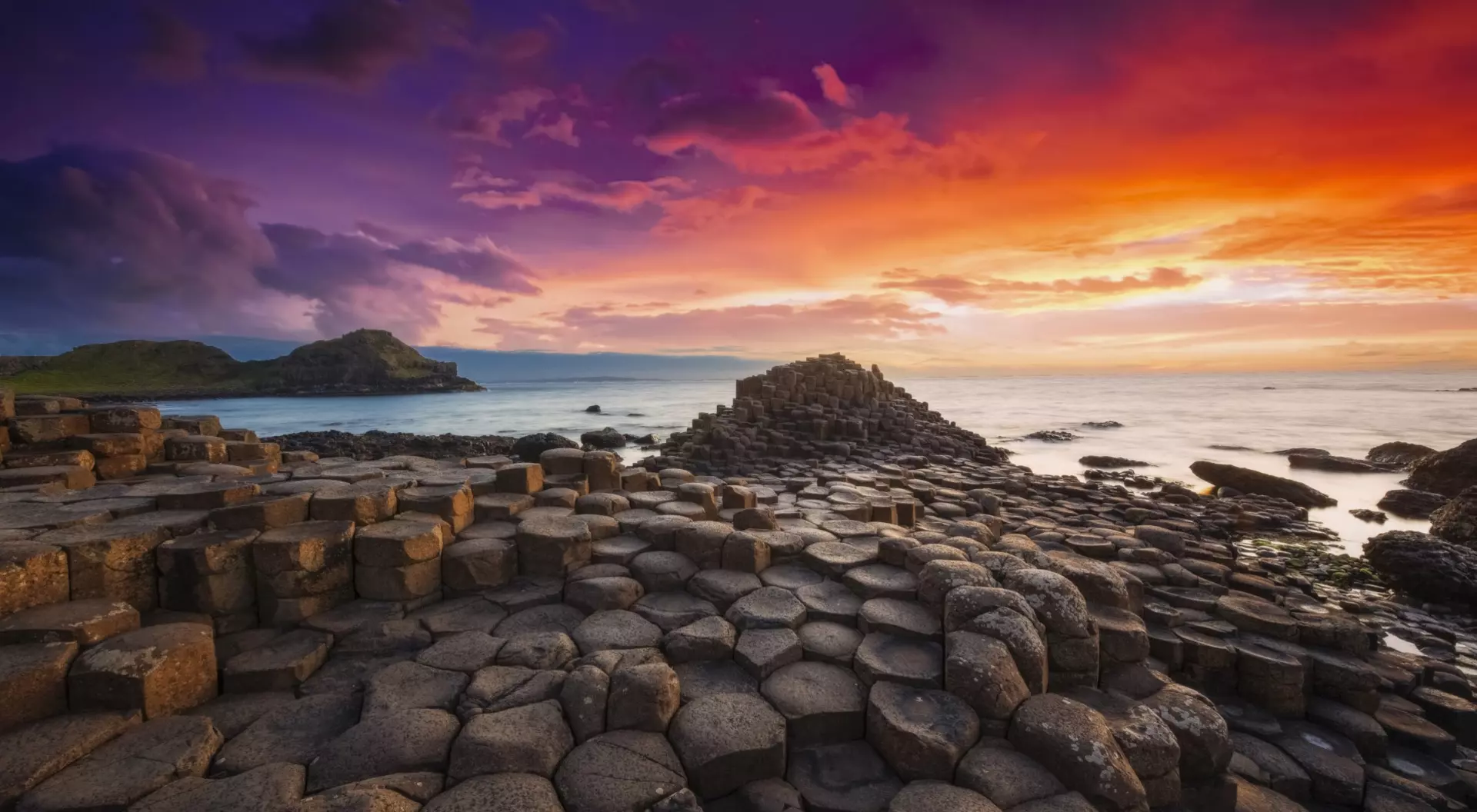 Colourful sunset at the Giant's Causeway Northern Ireland