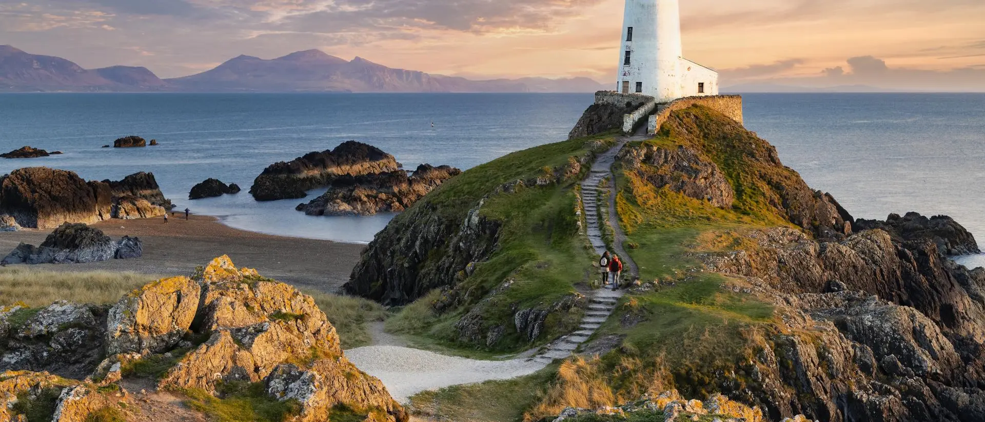 Tŵr Mawr lighthouse on Ynys Llanddwyn on Anglesey, Wales, marks the western entrance to the Menai Strait