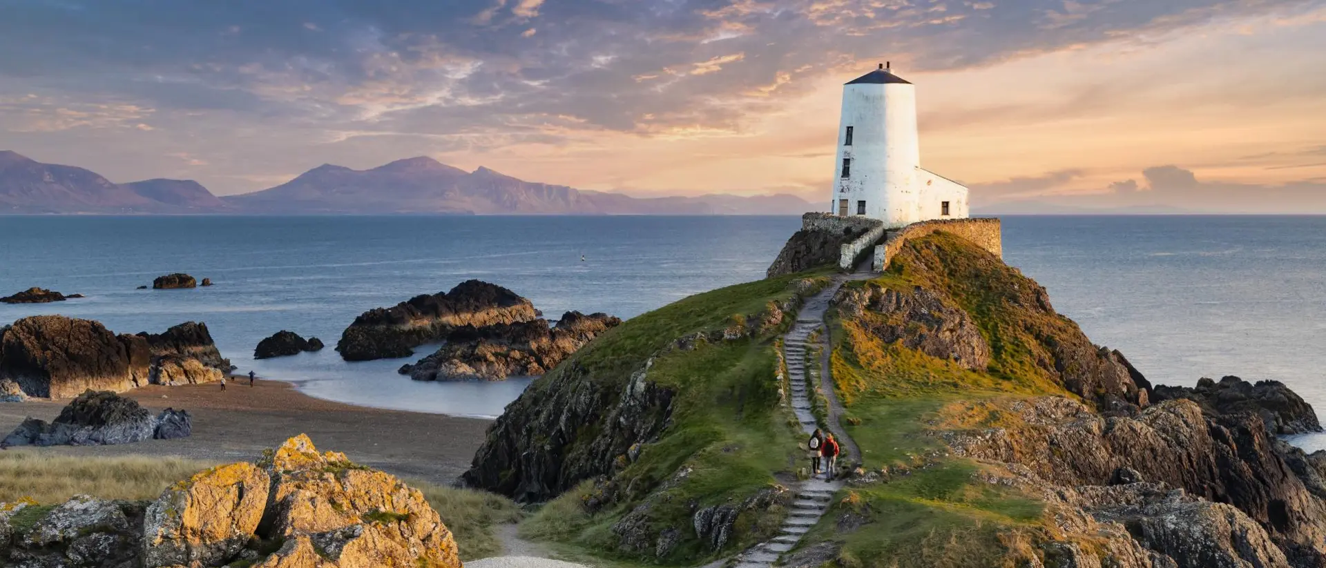 Tŵr Mawr lighthouse on Ynys Llanddwyn on Anglesey, Wales, marks the western entrance to the Menai Strait