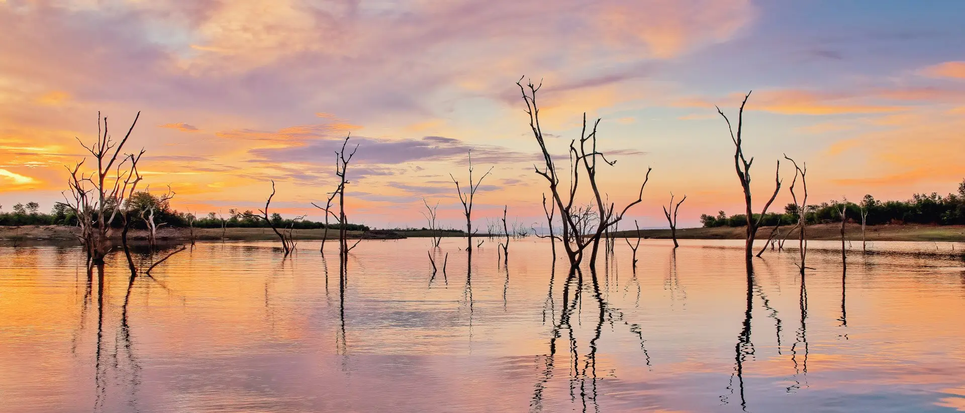 Lake Kariba is a man made lake, 226 km long and 40 km wide, located on the border between Zambia and Zimbabwe.