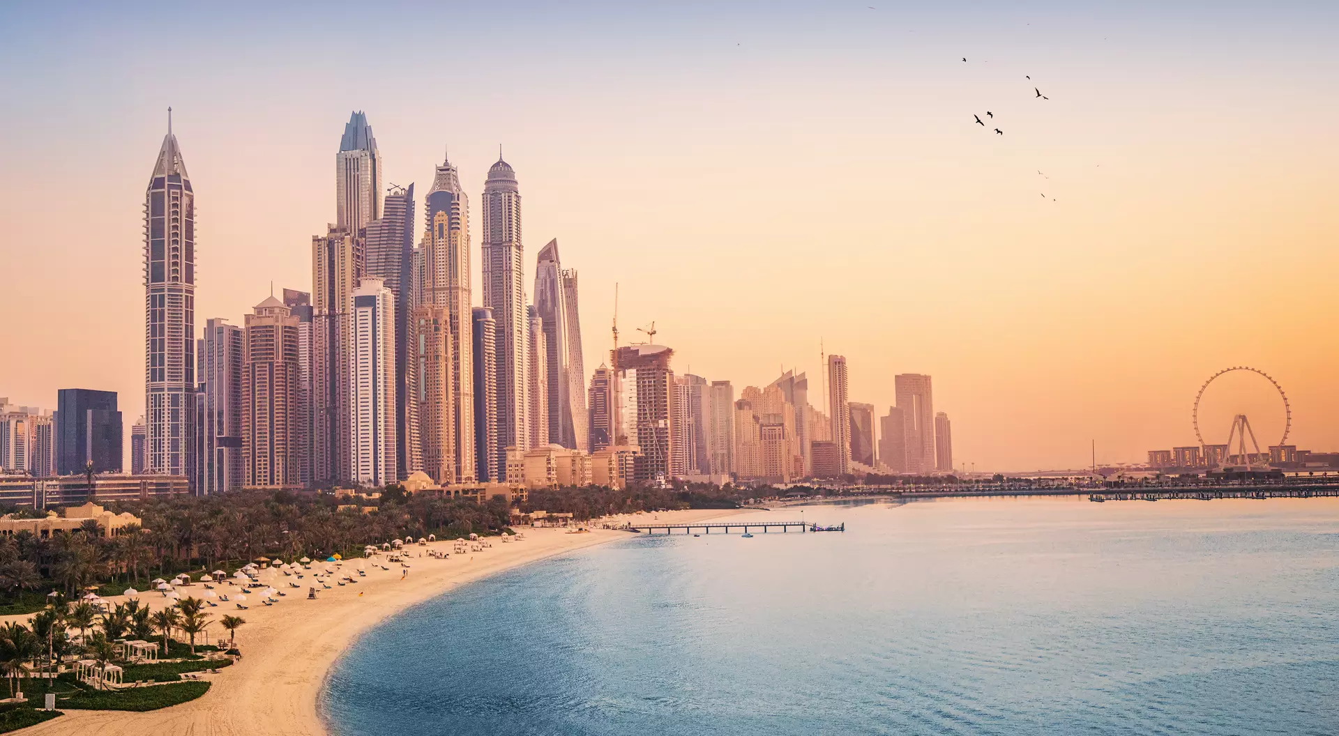 Dubai Marina Sunset view of the Dubai Marina and tthe golden sand beaches in the Persian Gulf