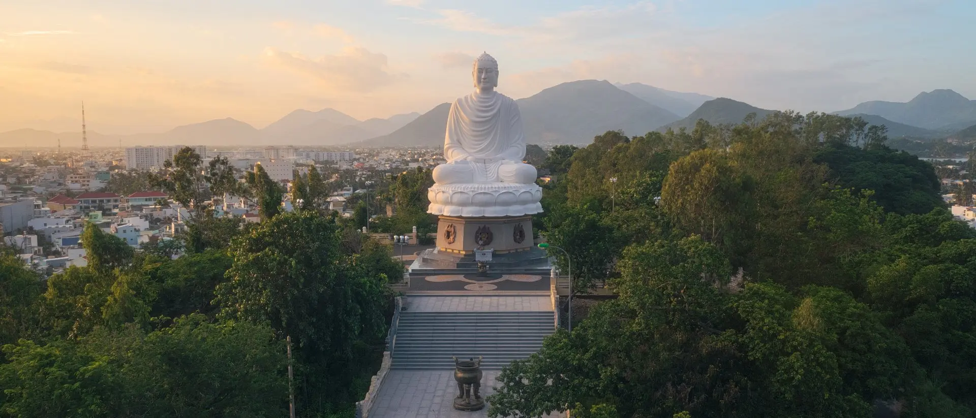 Long Son Pagoda Aerial view of White Buddha statue on Long Son pagoda in Nha Trang city, Khanh Hoa province, central Vietnam