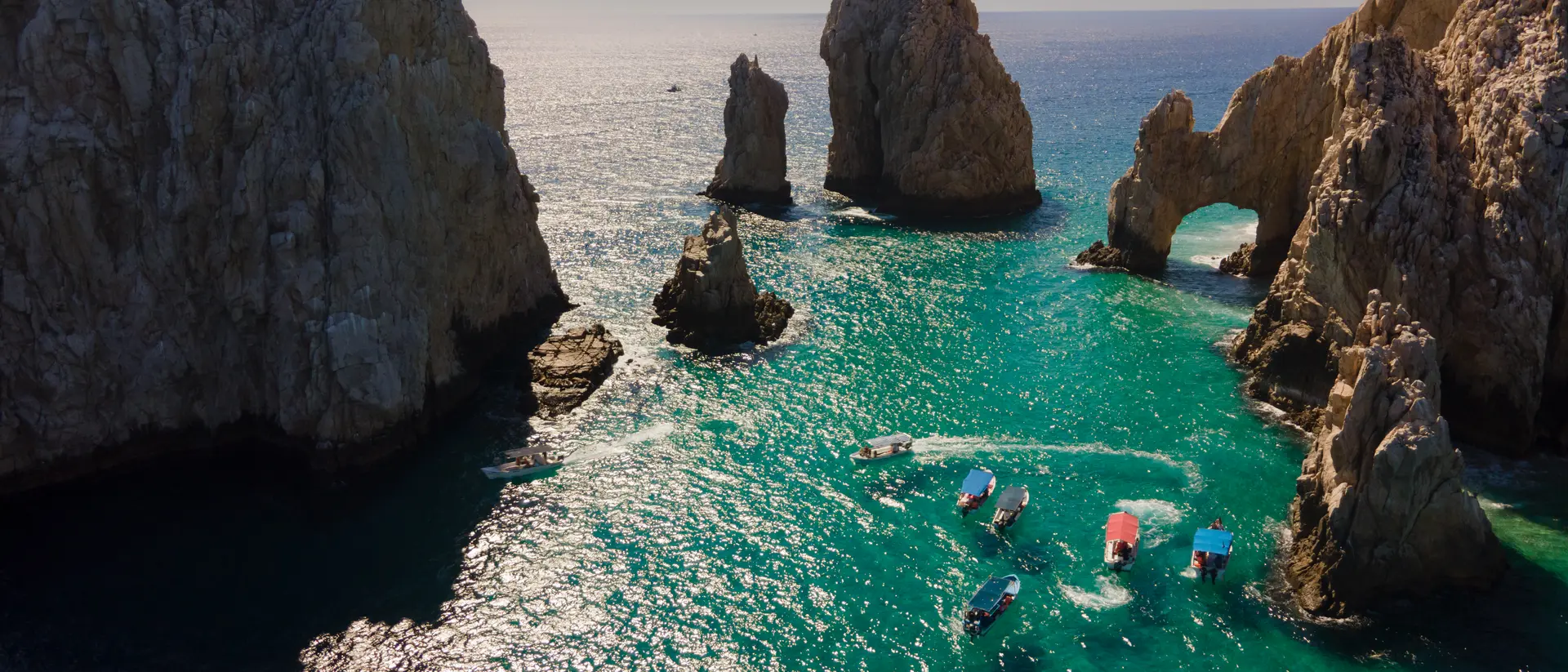 Cabo San Lucas iconic El Arco rock formation that erupts from the sea at the tip of the Baja Peninsula