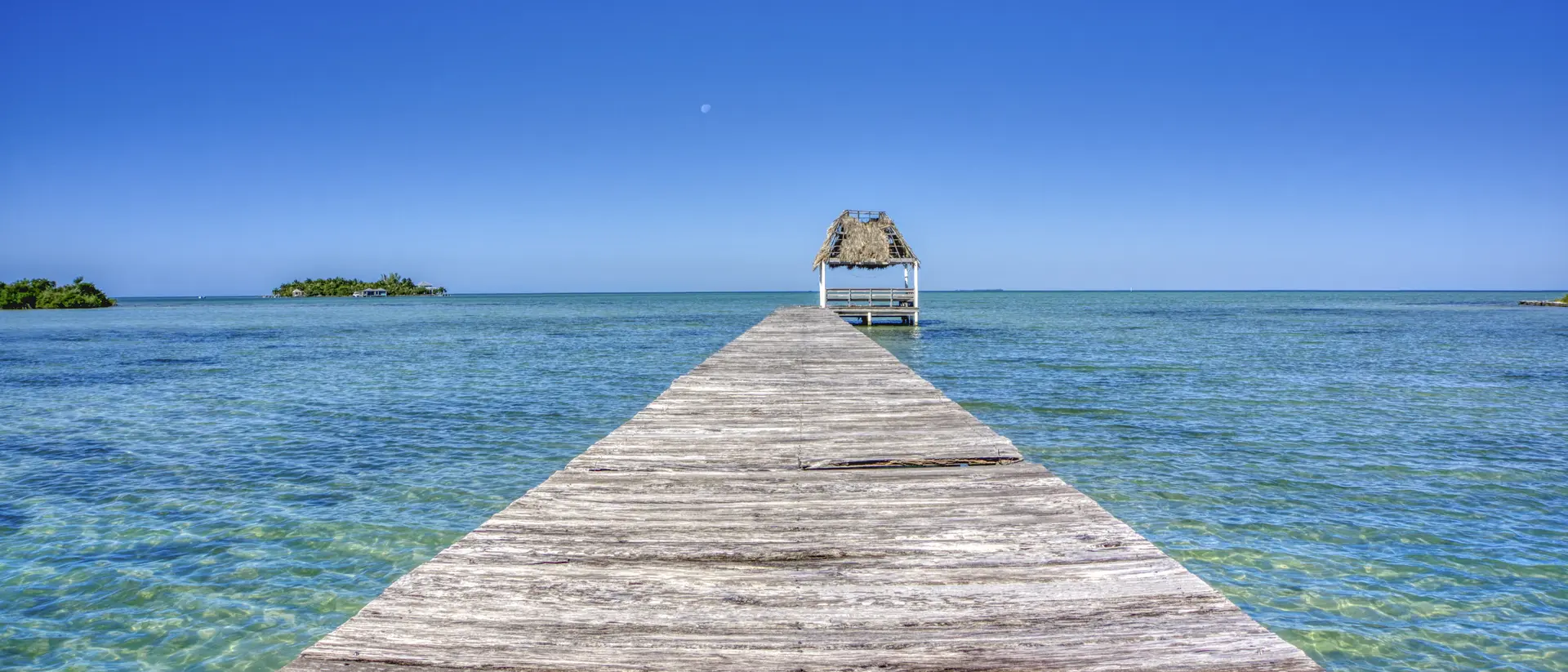 San Pedro Island Pier over the blue sea on San Pedro Island in the Caribbean nation of Belize