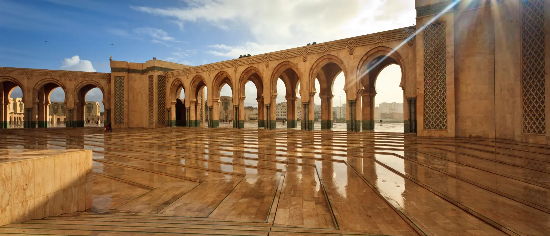 Sparkling marble arcade of Hamman II Mosque on a Sunny Day