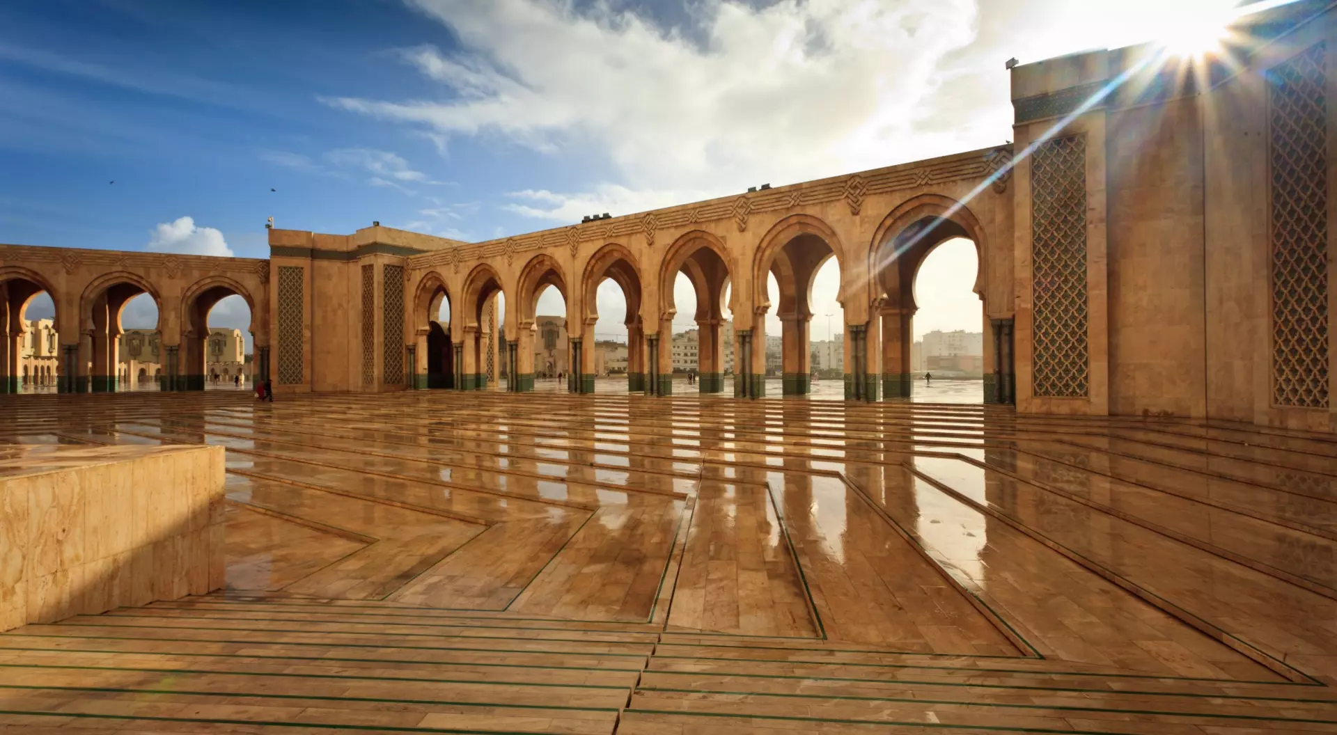 Casablanca, Morocco Sparkling marble arcade of Hamman II Mosque on a Sunny Day