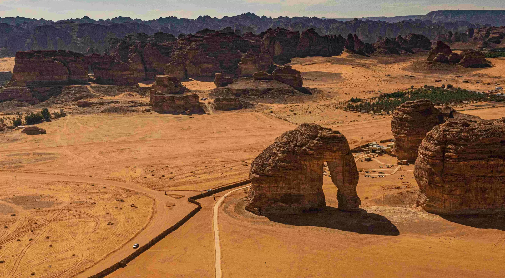 Aerial view of Elephant Rock (Jabal AlFil). From afar, this rock looks like an elephant with a ground-bound trunk.