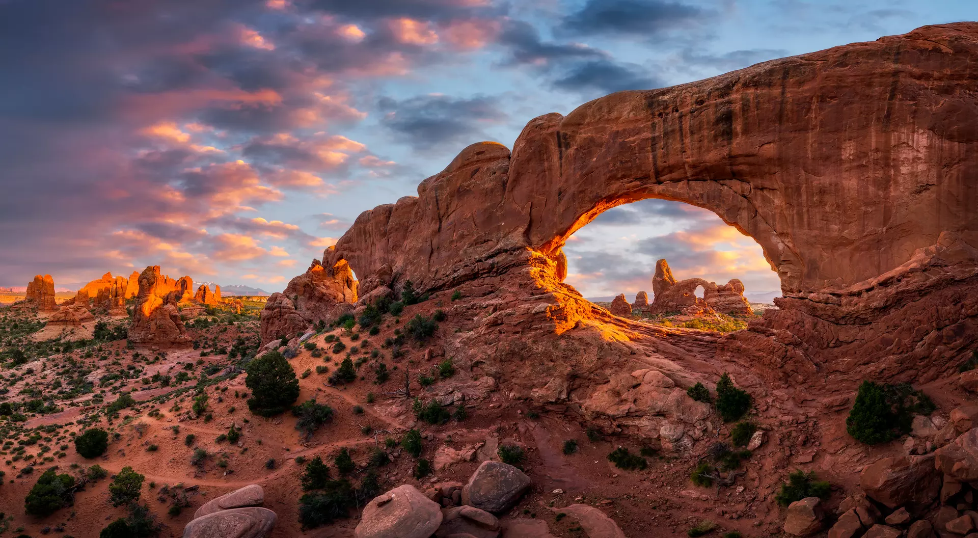 Utah's Arches National Park Scenic sky over the North Window arch with Turret Arch in the background from Utah's Arches National Park