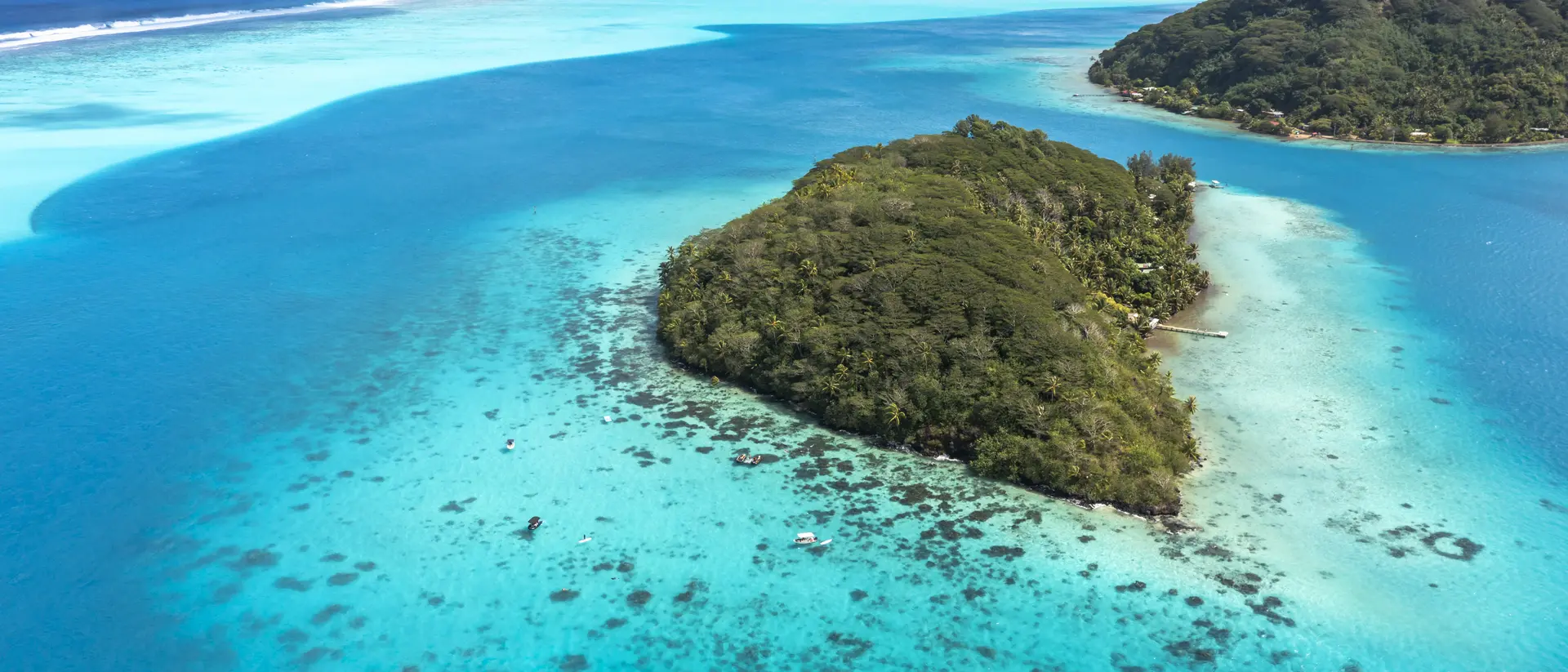 Huahine A deep, crystal-clear lagoon surrounds the two islands, while magnificent bays and white-sand beaches add drama