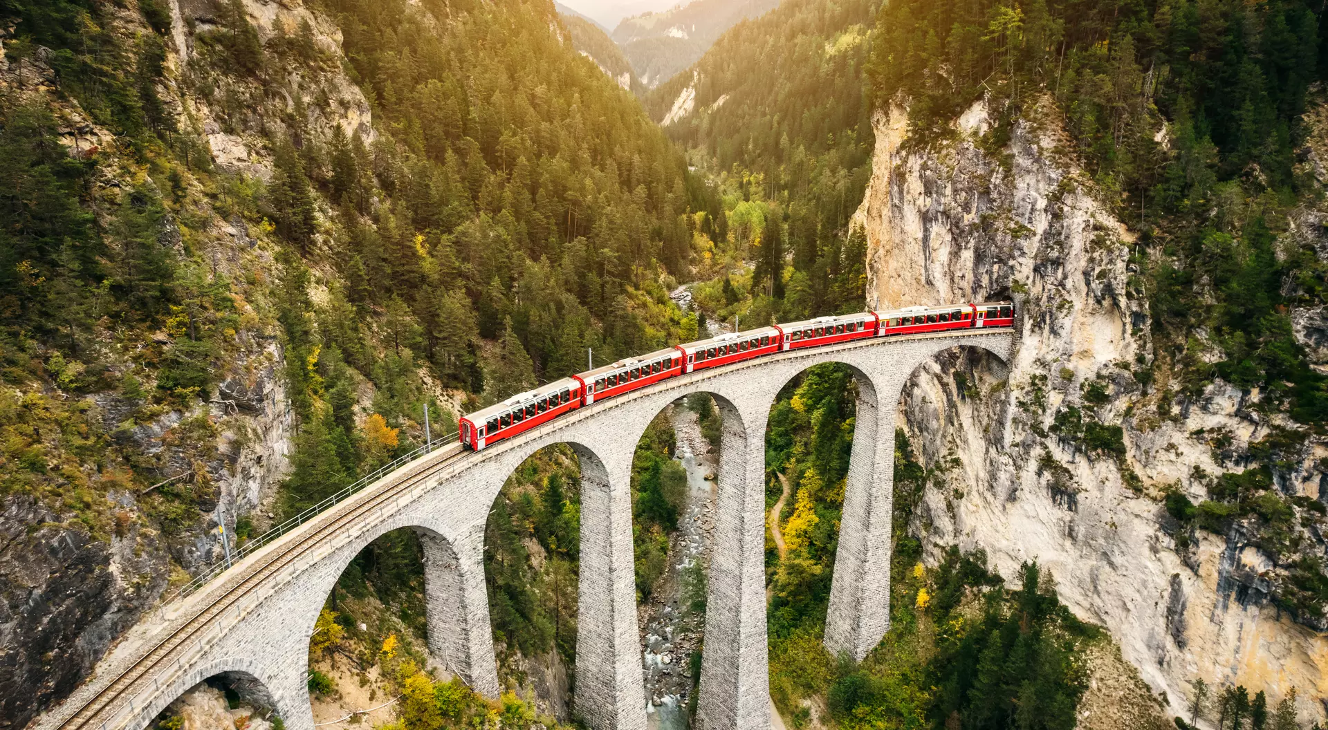Train crossing Landwasser Viaduct on raethian railway in Filisur – Albula, Graubunden, Switzerland