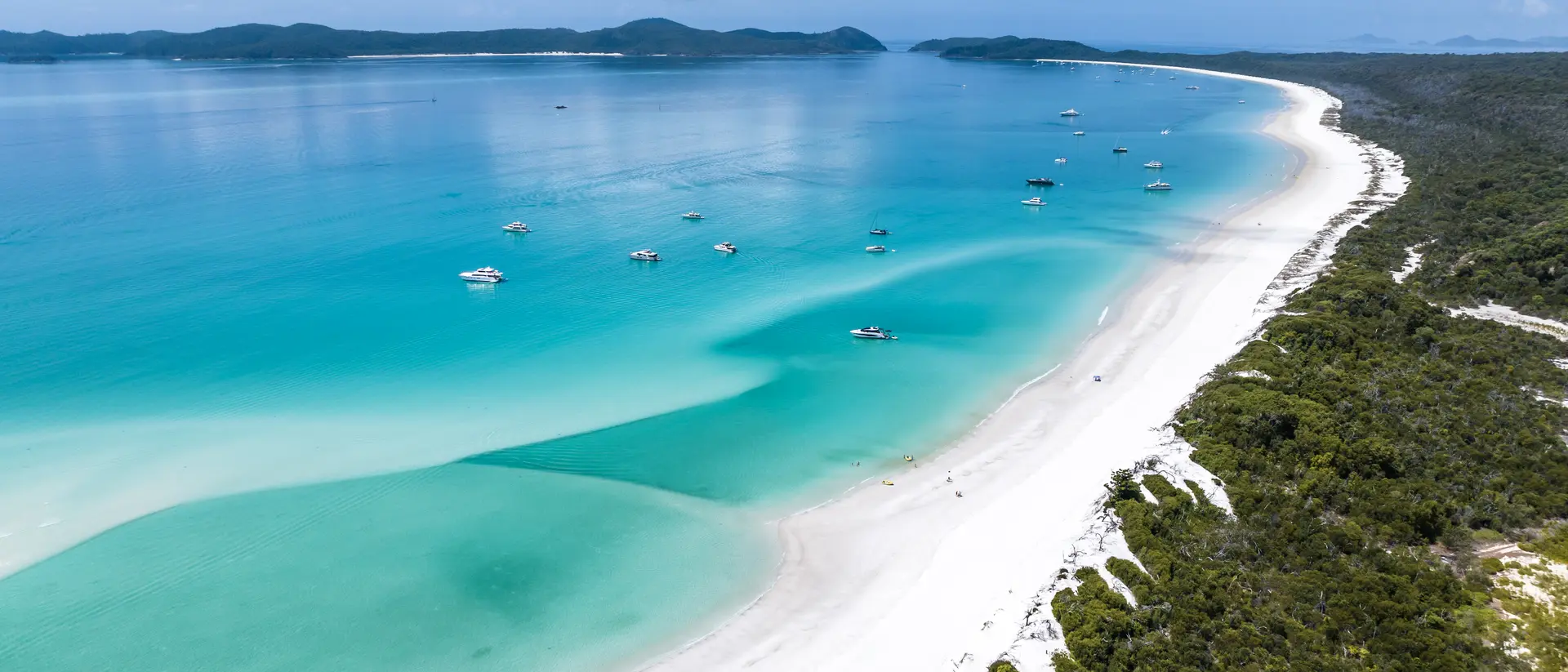Whitehaven Beach High angle aerial drone view of famous Whitehaven Beach, part of the Whitsunday Islands National Park near the Great Barrier Reef, Queensland, Australia