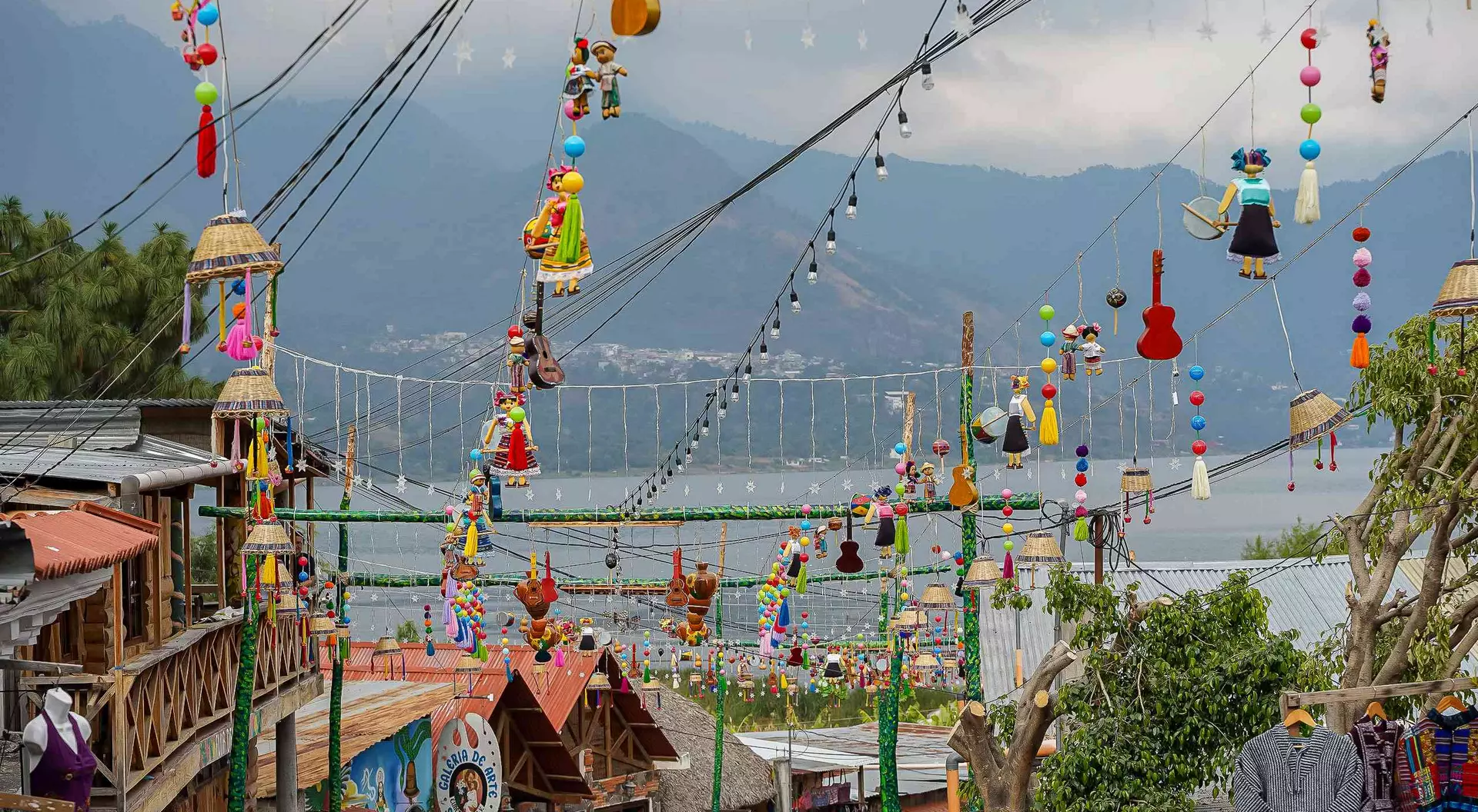 Hanging umbrellas in the colorful streets of San Juan La Laguna at Lake Atitlan, Guatemala