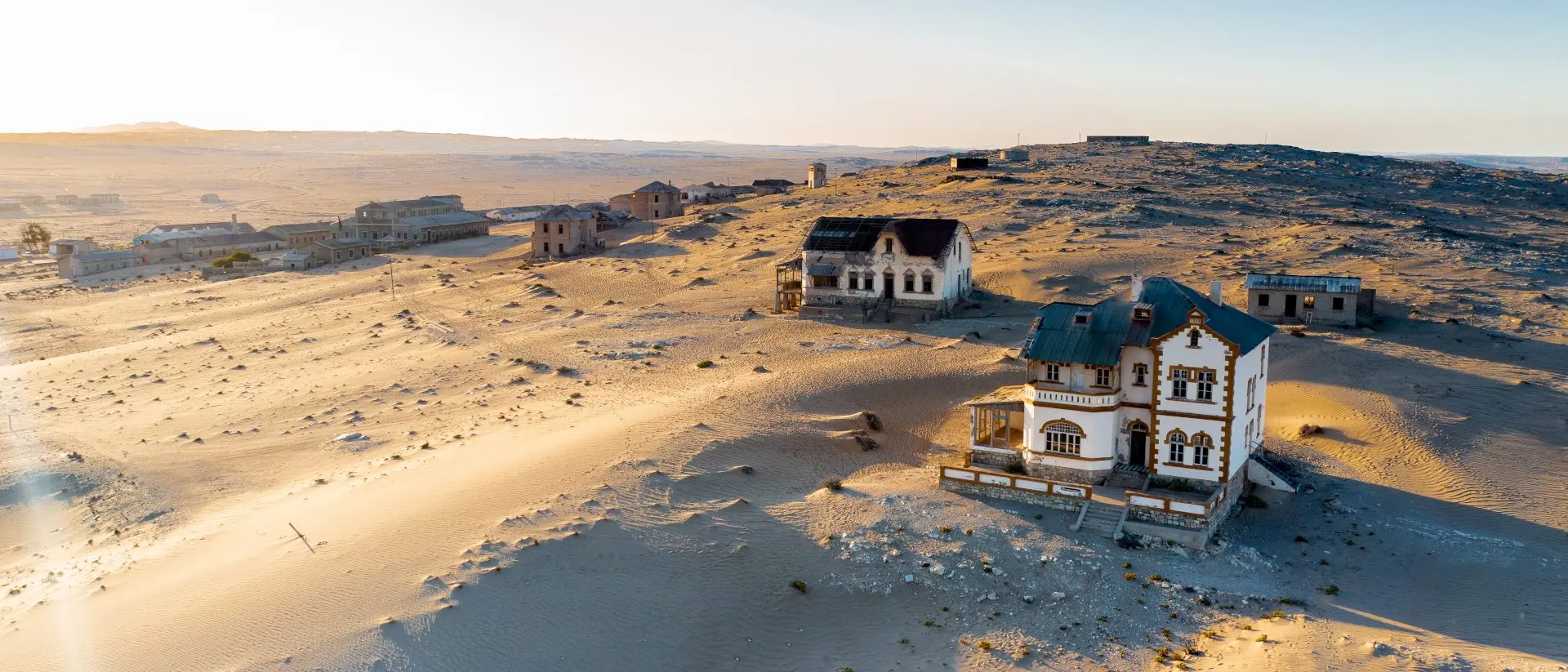 Kolmanskop ghost town Deserted homes in Kolmanskop ghost town near Luderitz in Namibia, the site of an abandoned diamond mine