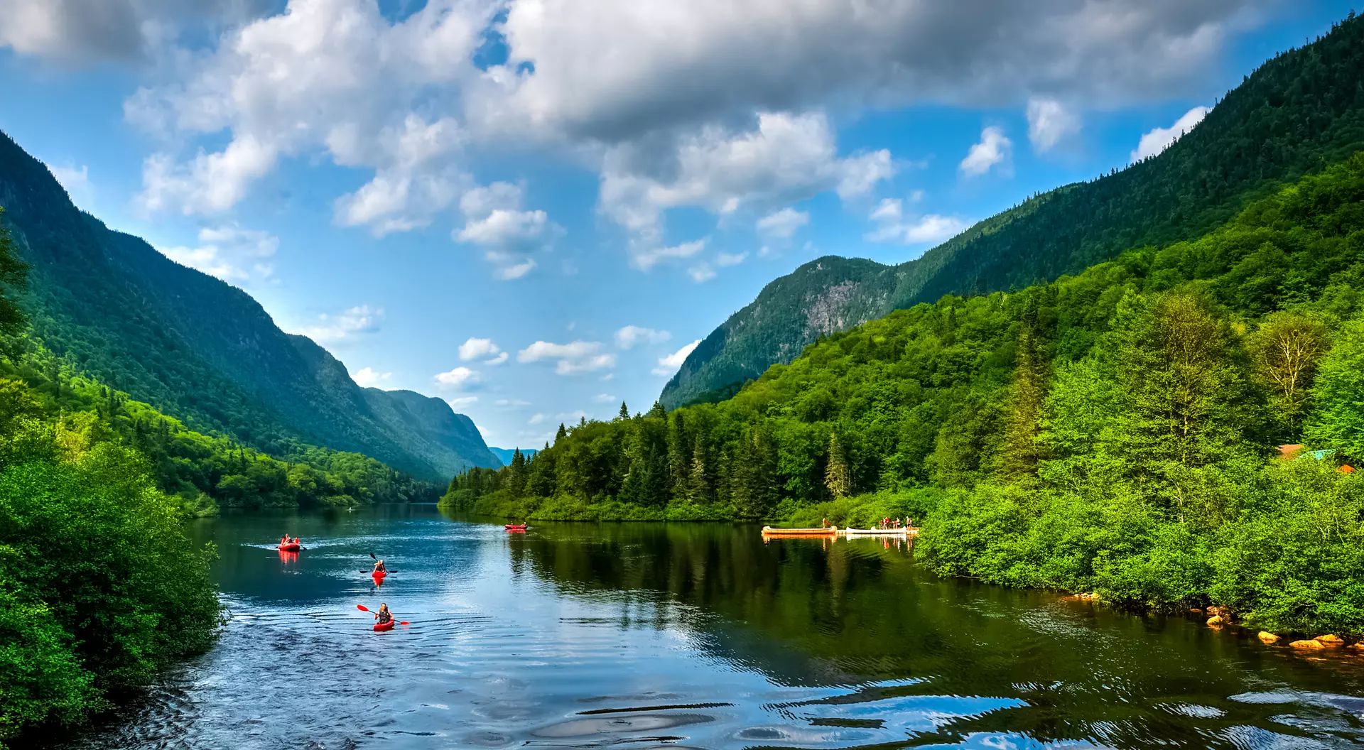Jacques Cartier River People rafting Jacques Cartier river on a perfect sunny summer day, Quebec, Canada