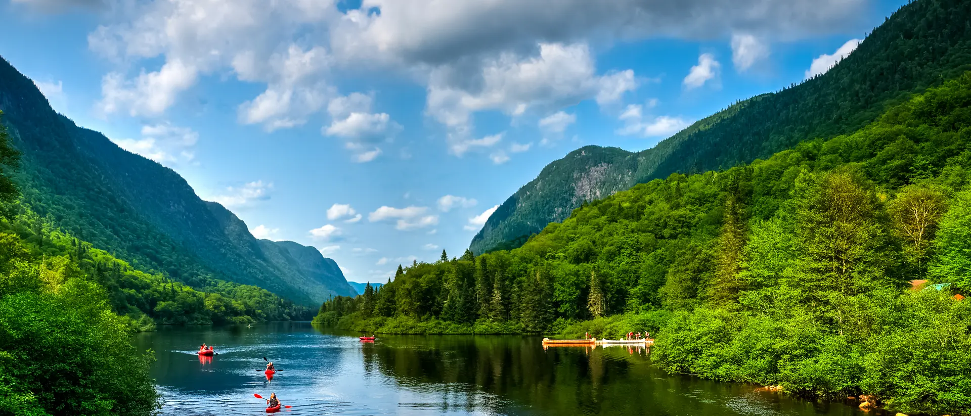 Jacques Cartier River People rafting Jacques Cartier river on a perfect sunny summer day, Quebec, Canada