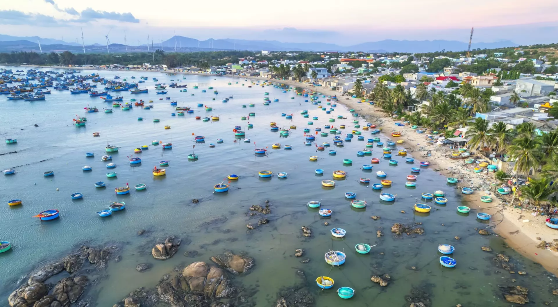 Mui Ne, Phan Thiet "Aerial view of Mui Ne fishing village in the morning with hundreds of boats anchored to avoid storms"