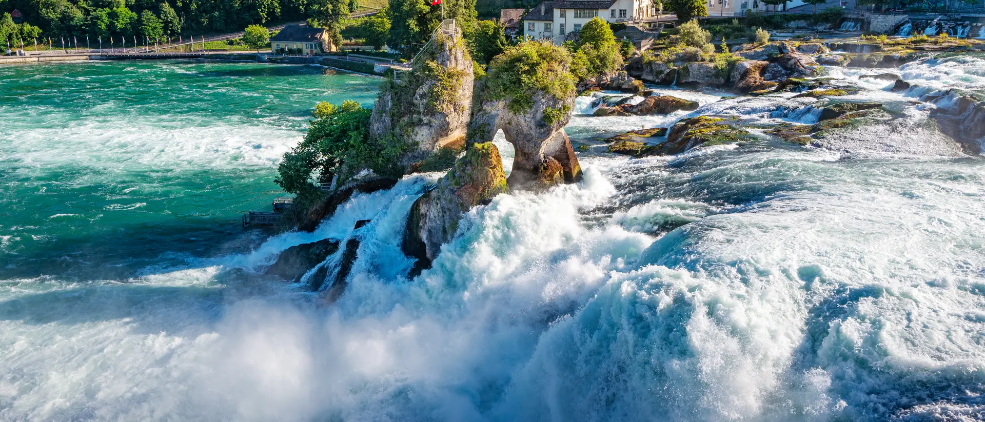Switzerland Rhine River cascading down Europe's largest waterfall, The Rhine Falls