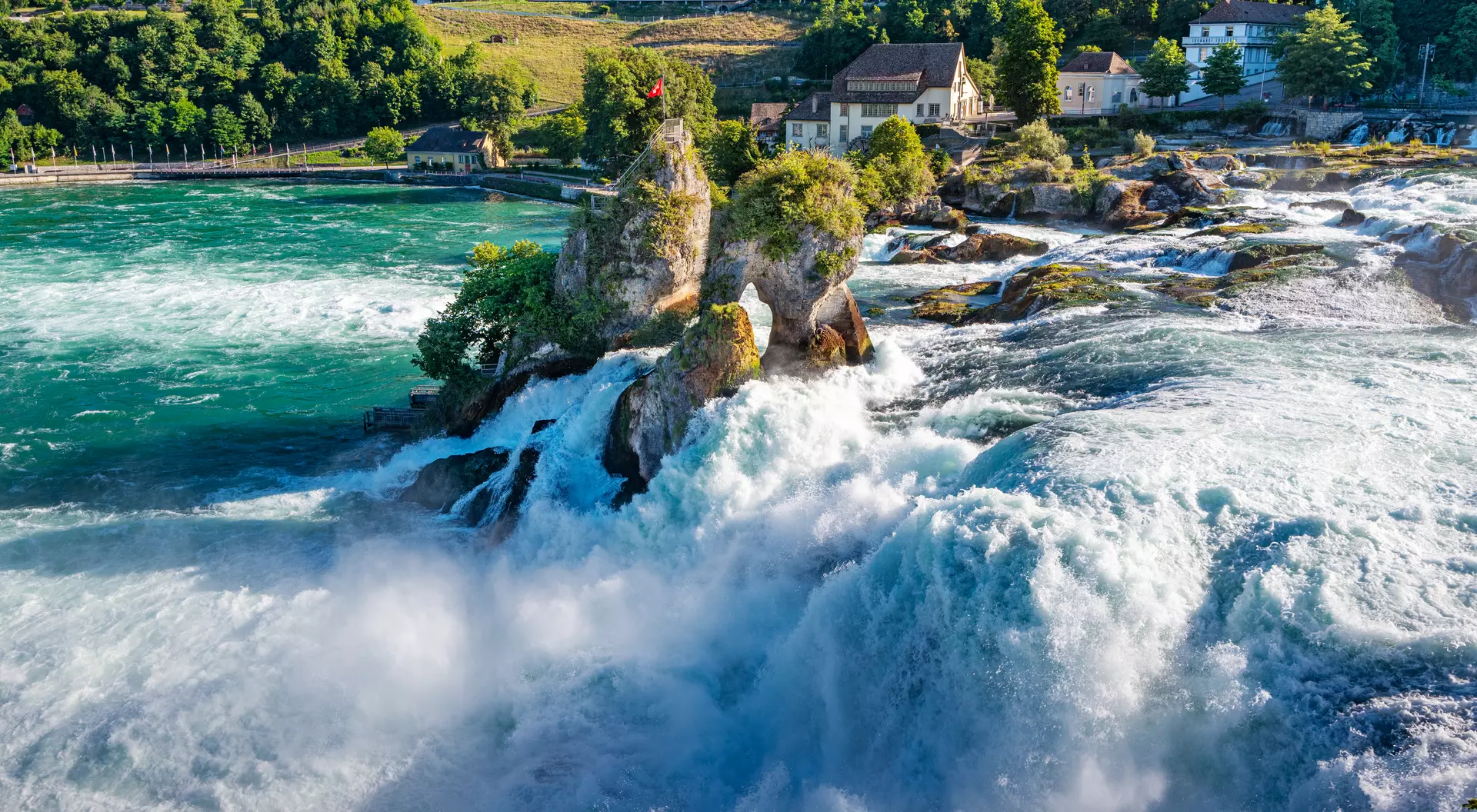 Switzerland Rhine River cascading down Europe's largest waterfall, The Rhine Falls