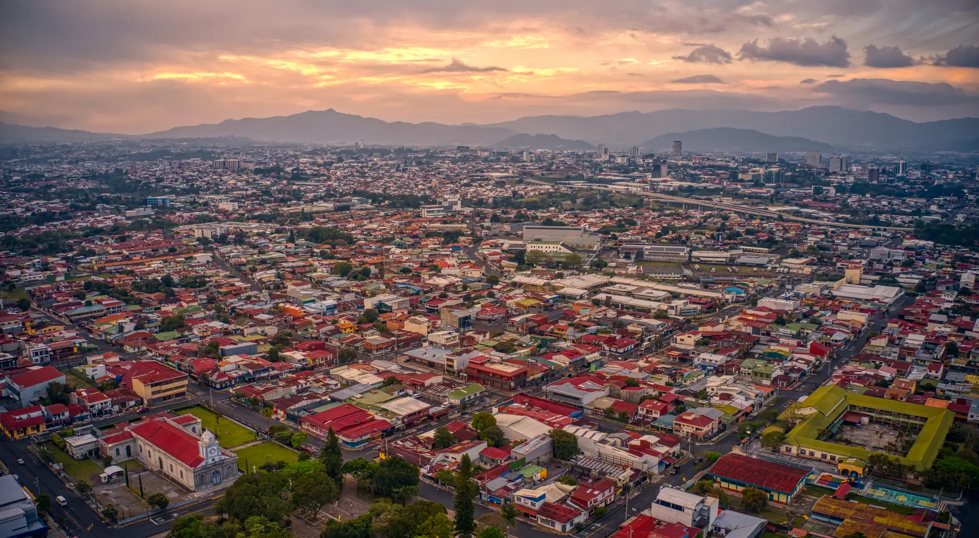 San Jose Aerial view of the many red tiled roofs in the capital city of Costa Rica, San Jose