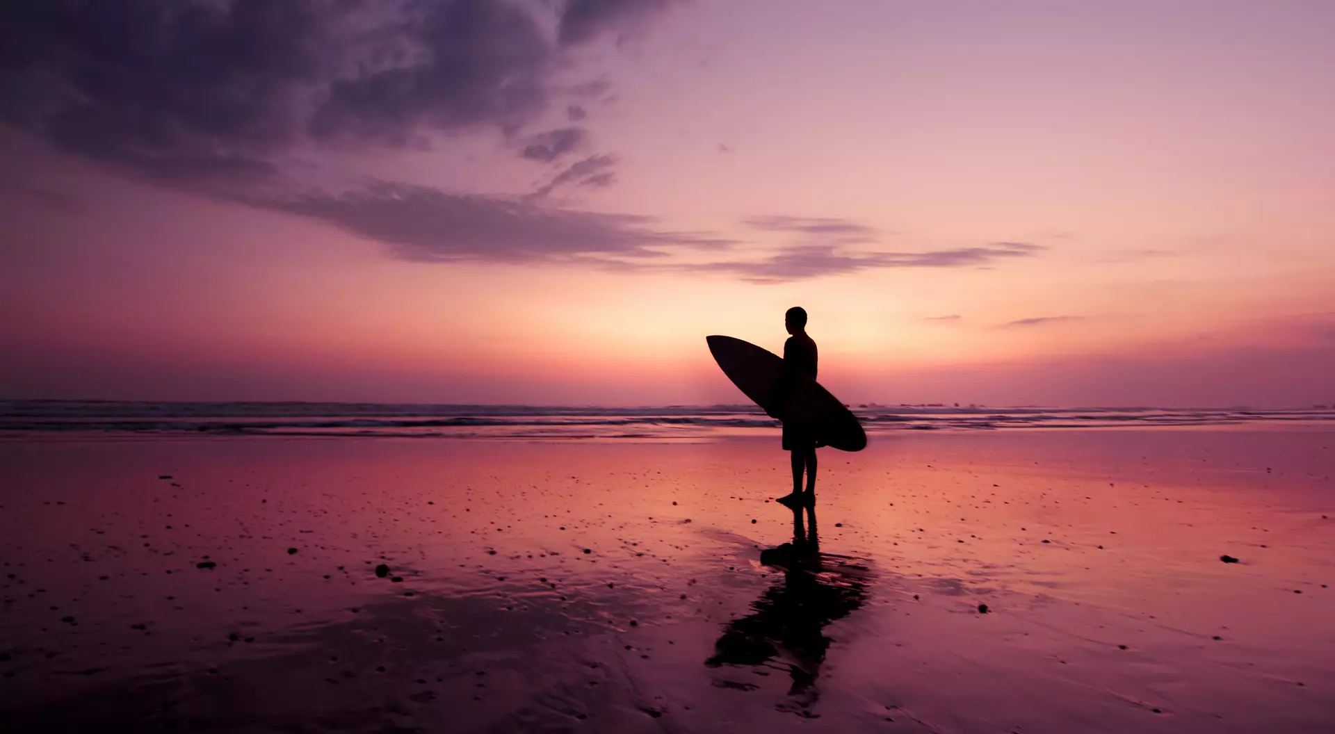 Costa Rica's Pacific Coast Surfer at sunset