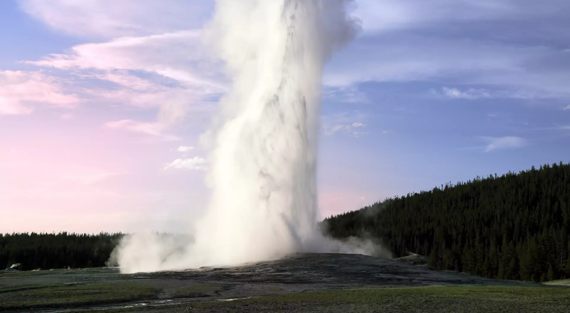Most popular geyser in the world, the Old Faithful in the Yellowstone National Park USA