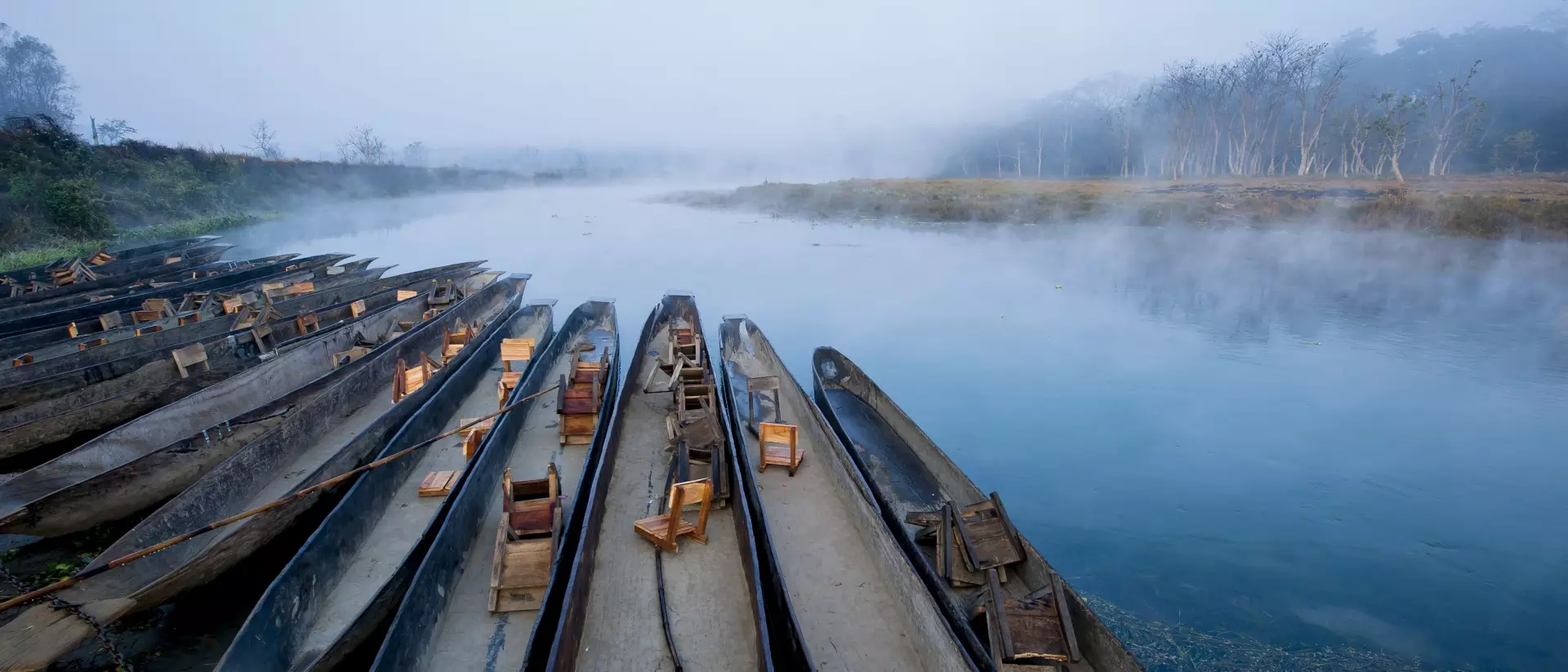 East Rapti River, Chitwan National Park Boats anchoring in East Rapti River