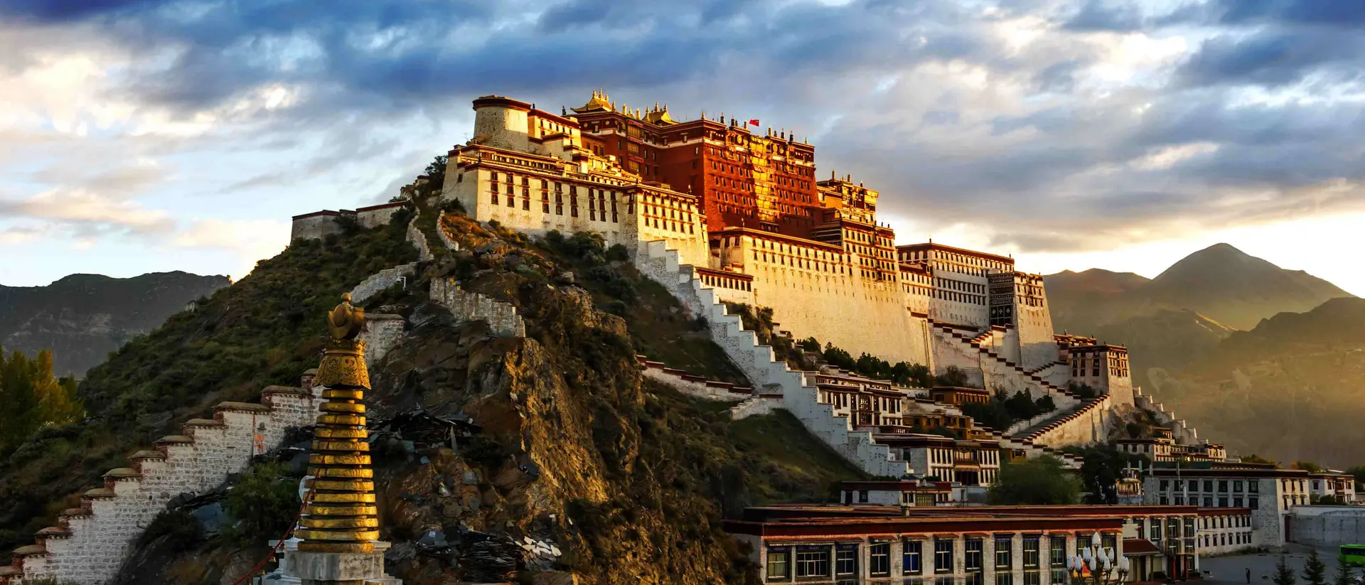 The red and white Potala Palace, is built on Red Mountain in the centre of Lhasa Valley and is the winter palace of the Dalai Lama