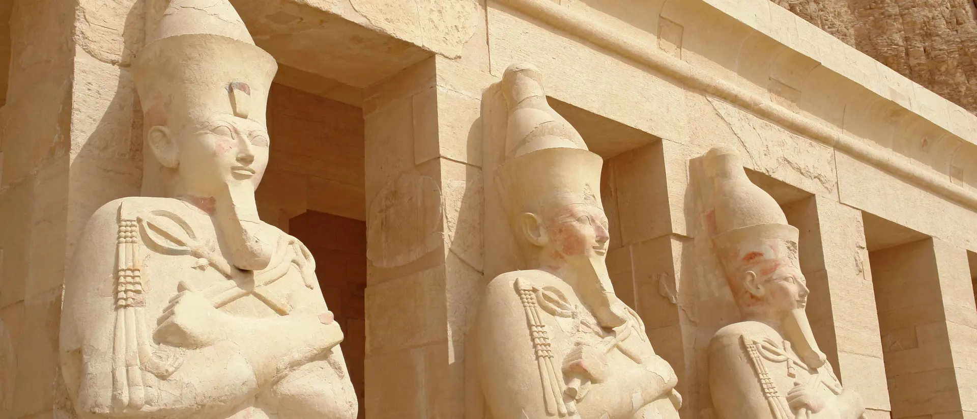 Egypt Three statues in the temple of Queen Hatshepsut in Valley of kings