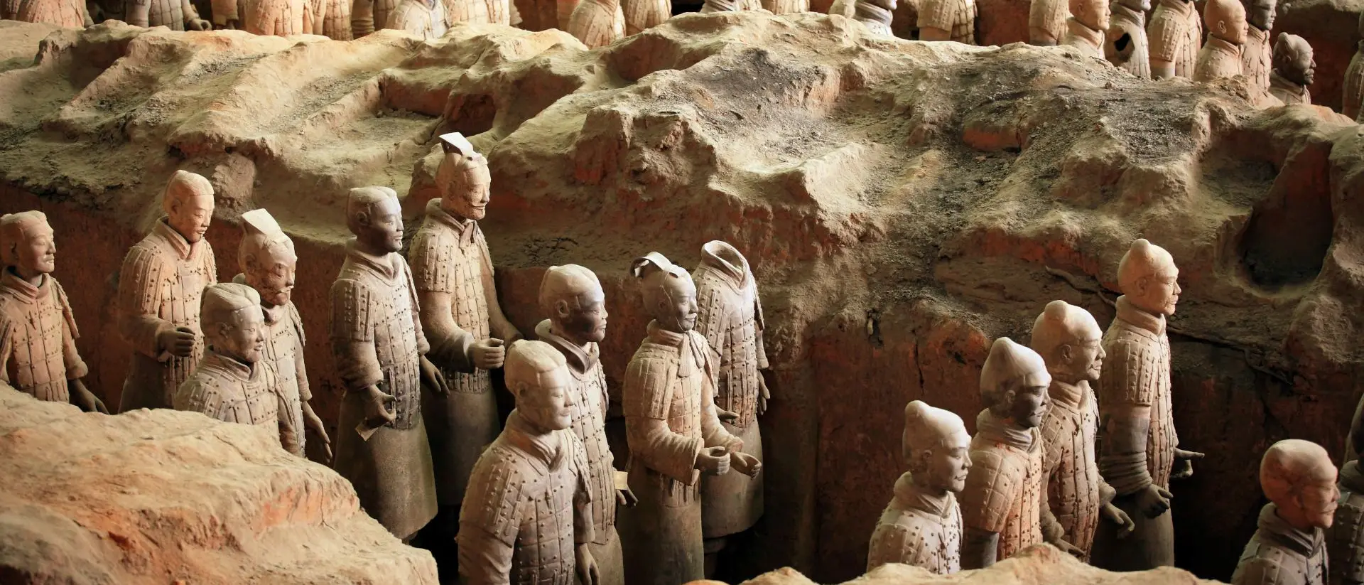 Terra-cotta army soilders, part of an elaborate mausoleum created to accompany the first emperor of China into the afterlife