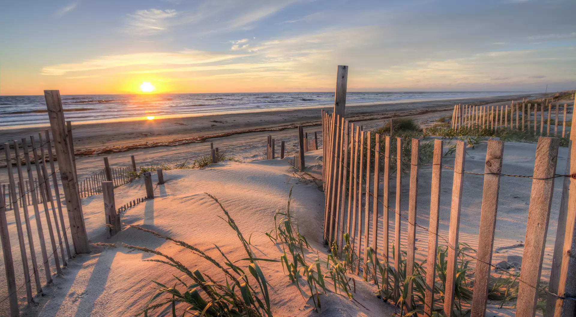 Outer Banks Sunrise as seen from the sand dunes at the Outer Banks, NC around Corolla Beach