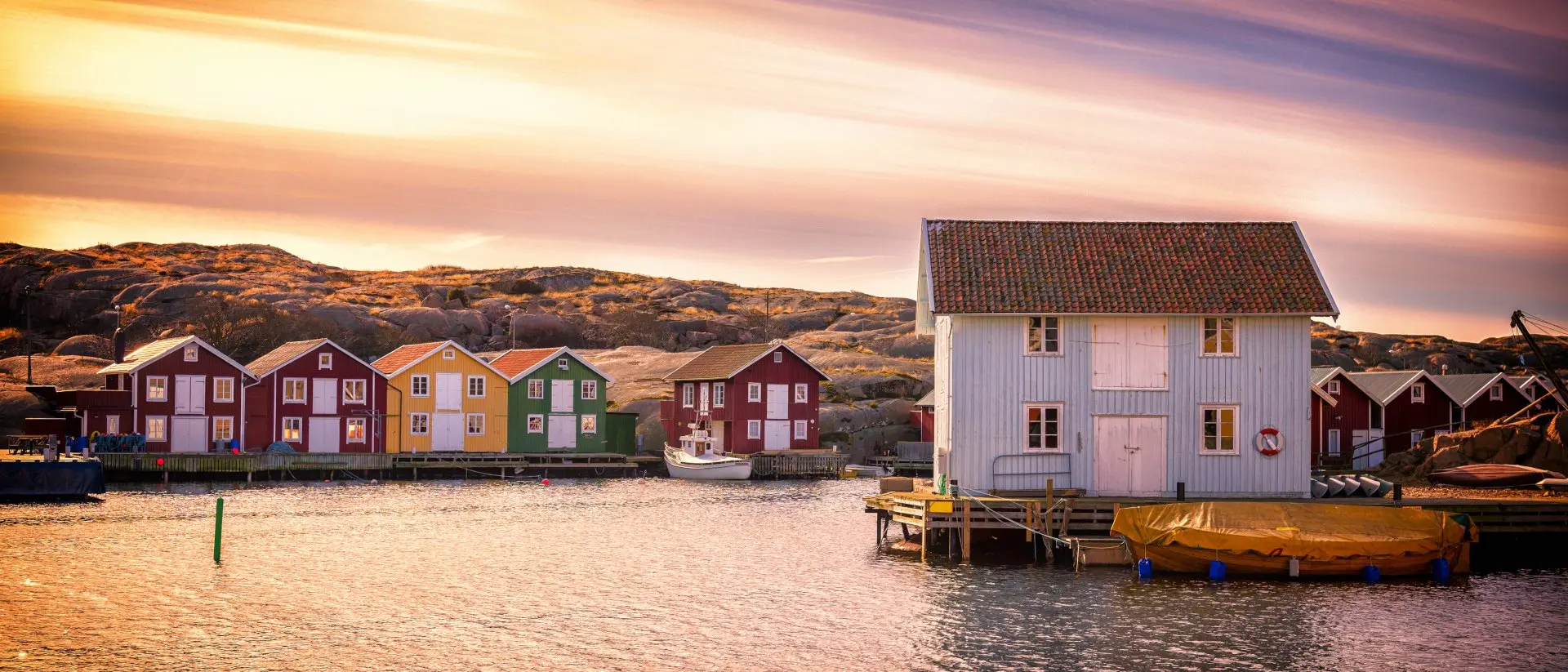 Beautiful landscape view of sunset and houses at Smogen
