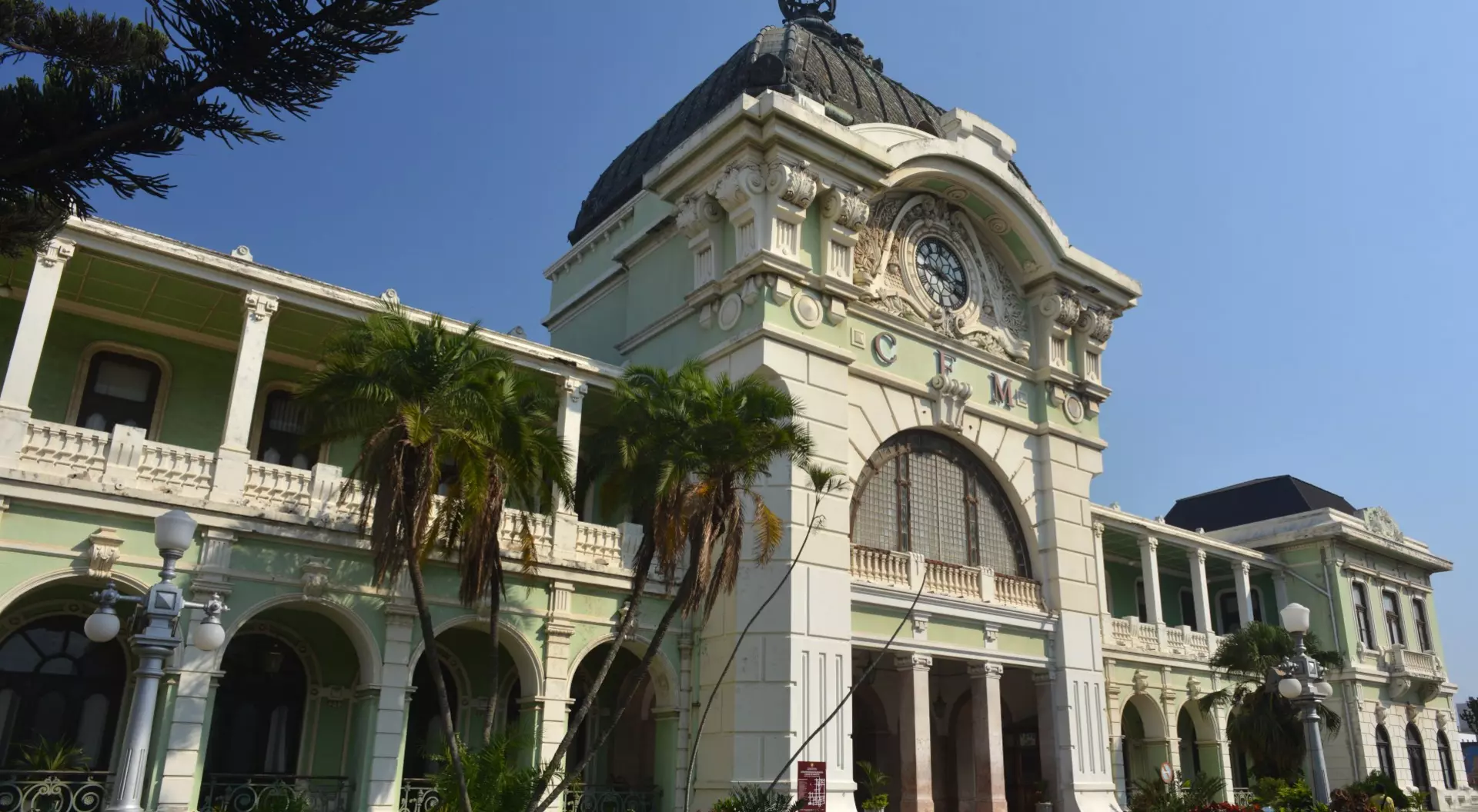 View of CFM (Caminho de Ferro de Mocambique) Railway Station in Maputo, capital of Mozambique. This Victorian style building was designed by Gustave Eiffel. In 1910 he used wrought iron for the roof dome and marble for the outside pillars and arches.