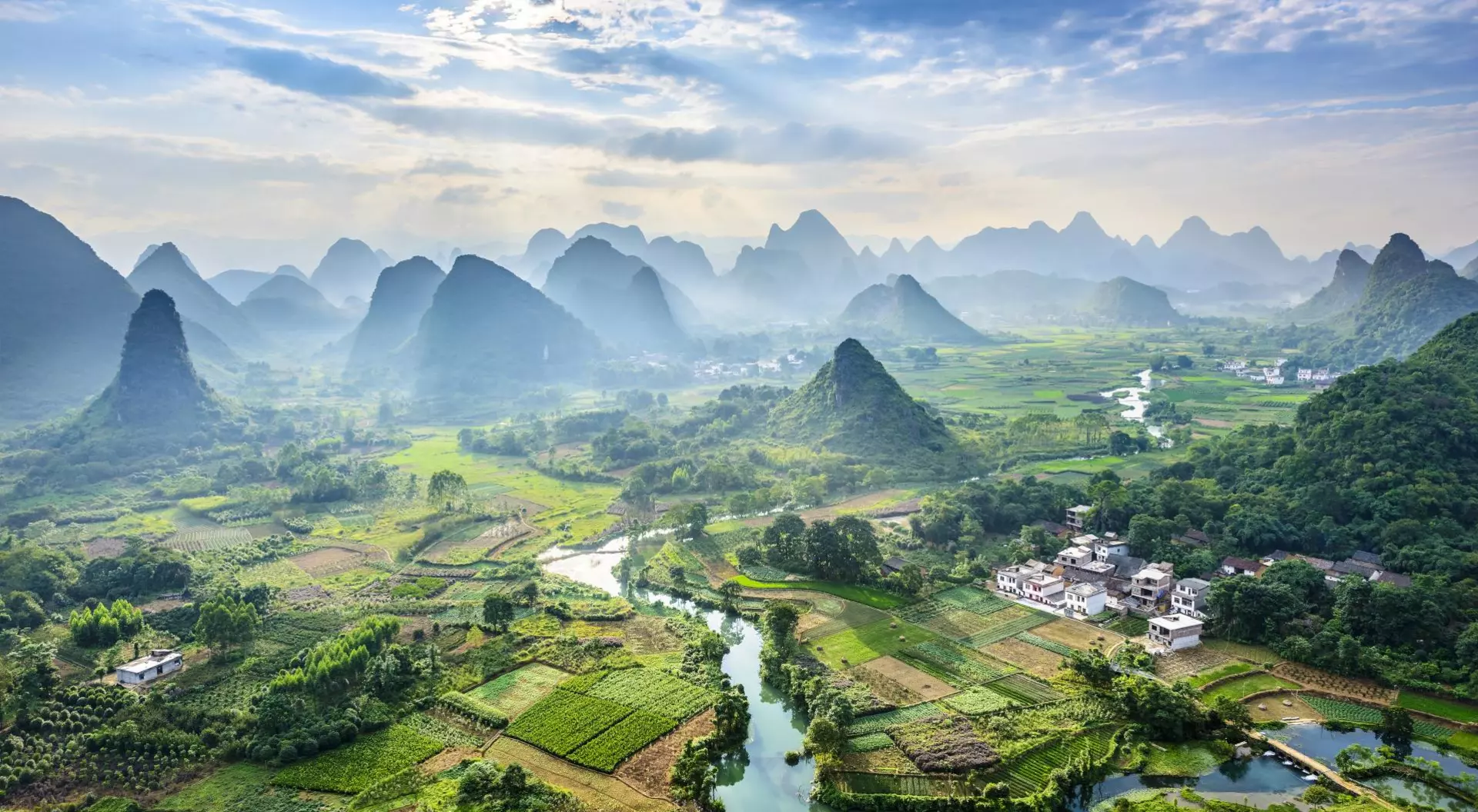Guangxi Province Soaring limestone karst peaks, bordered on one side by the Li River