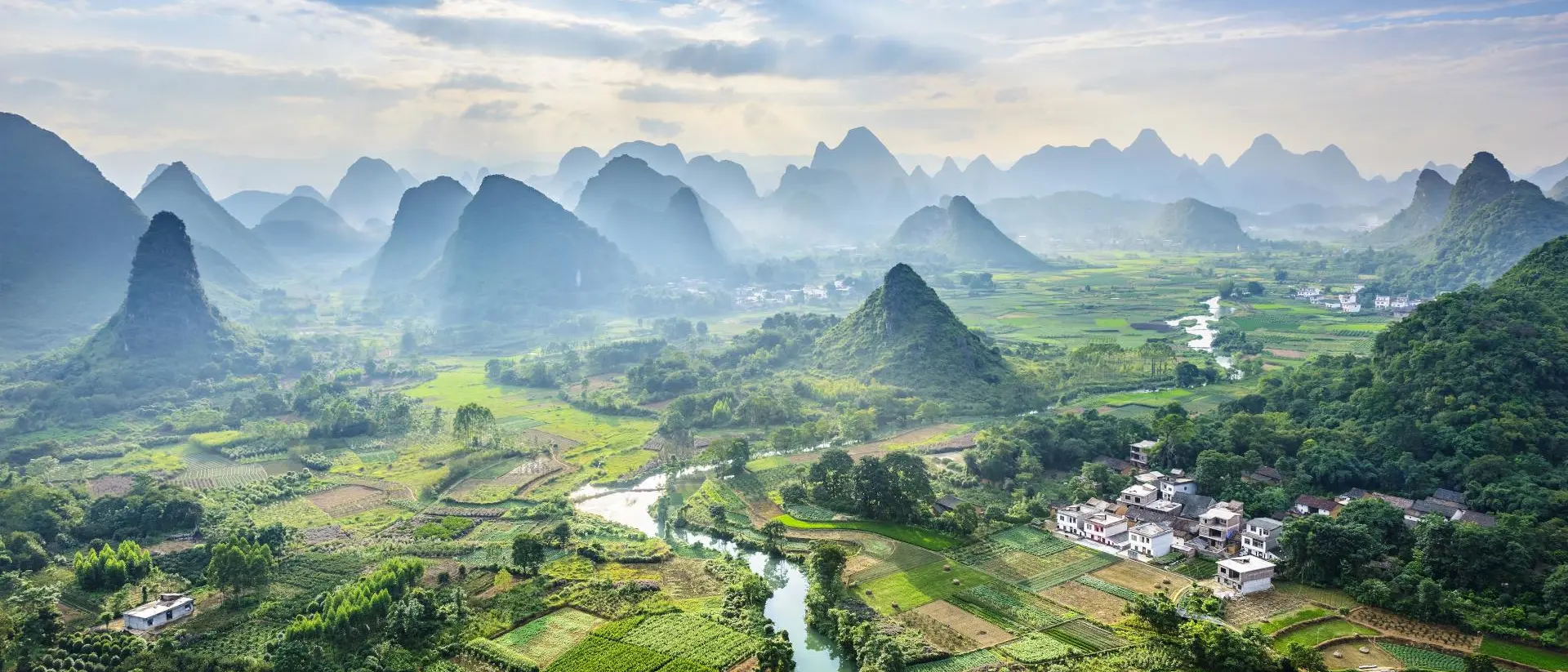 Guangxi Province Soaring limestone karst peaks, bordered on one side by the Li River