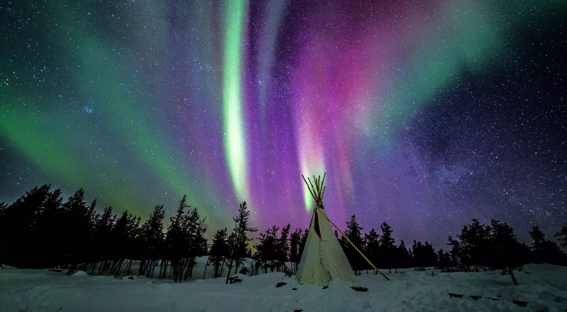 Yellowknife Northern lights and the Milky Way stock photo