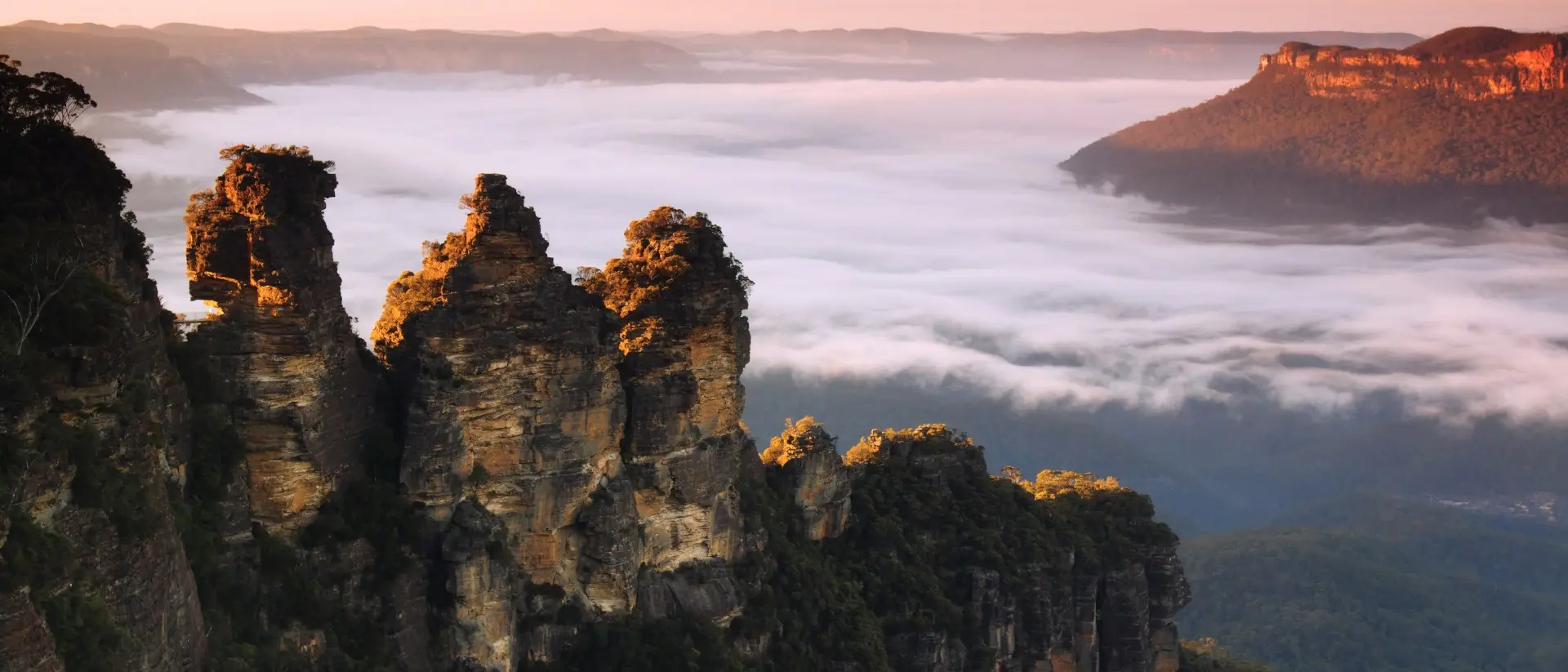 Famous rock formations with some early morning fog around them