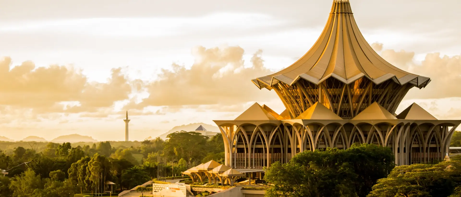 New Sarawak State Legislative Assembly Building at bank of Sarawak river in Kuching during sunset