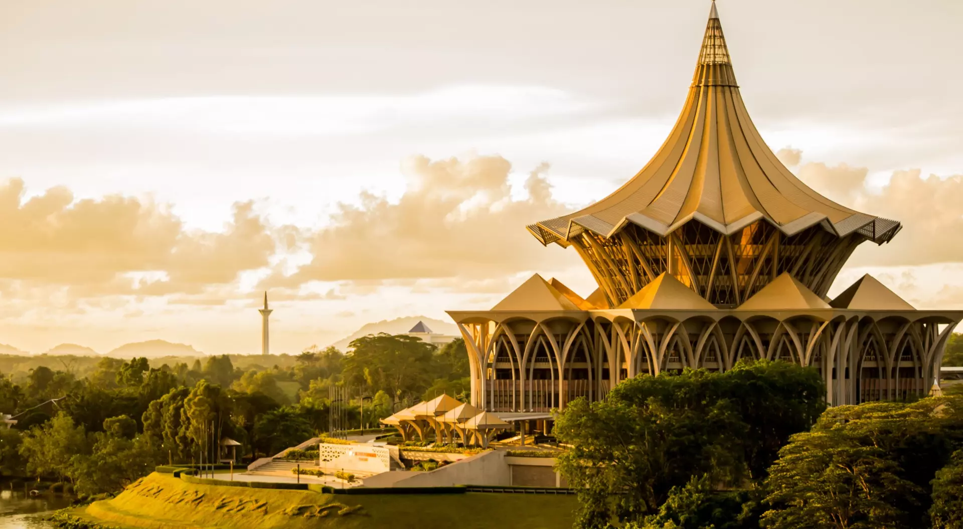 New Sarawak State Legislative Assembly Building at bank of Sarawak river in Kuching during sunset