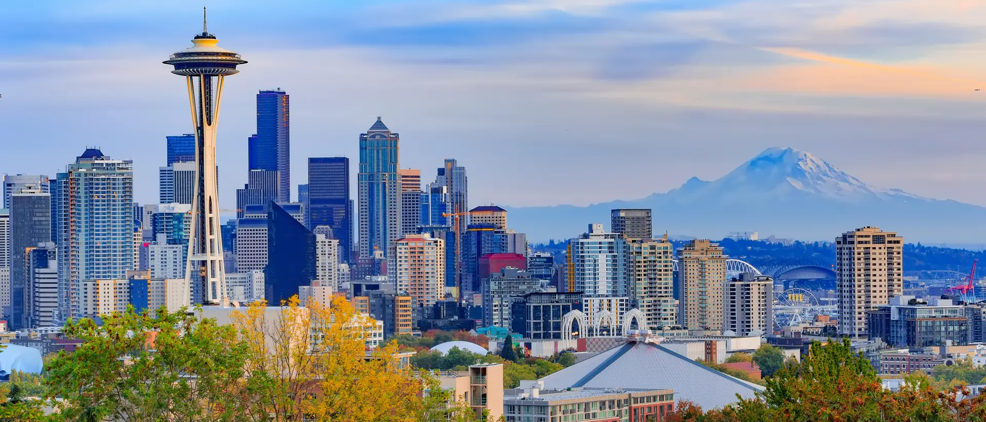 Seattle, United States City skyline featuring the space needle with Mount Rainier in the background