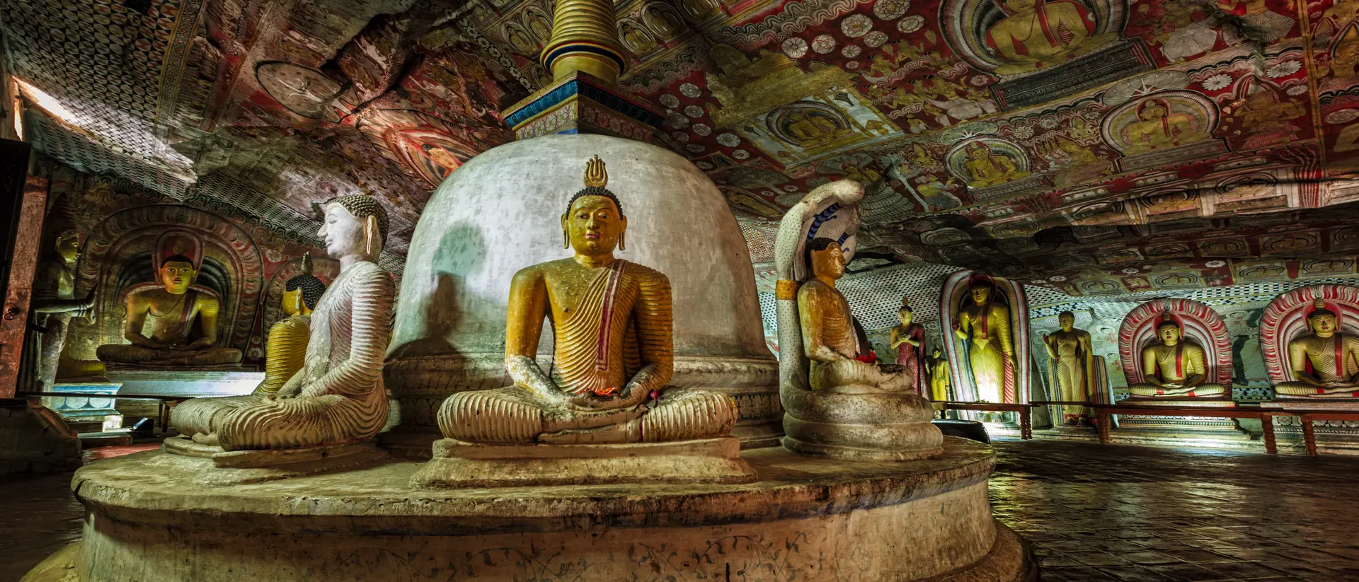 Buddha statue inside Dambulla cave temple, Sri Lanka.