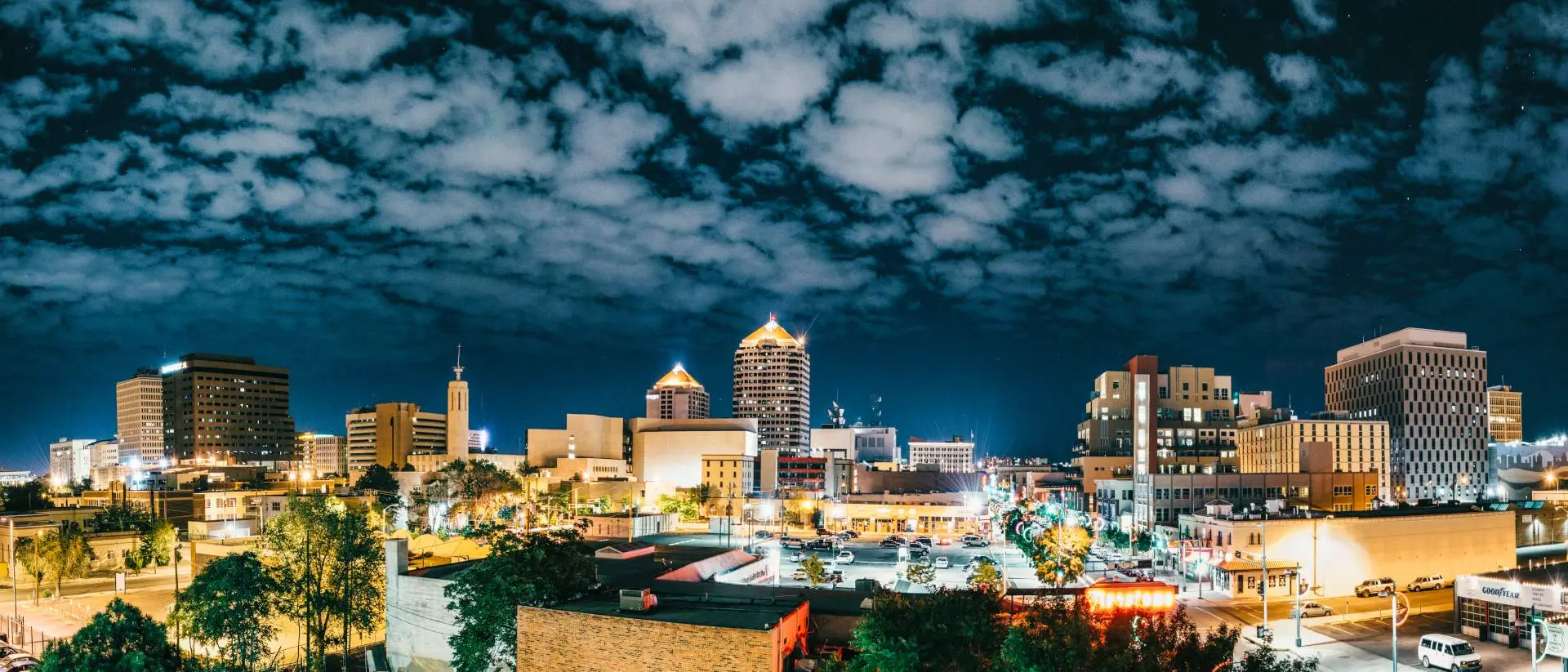 Albuquerque, United States Panoramic image of city skyline at night.