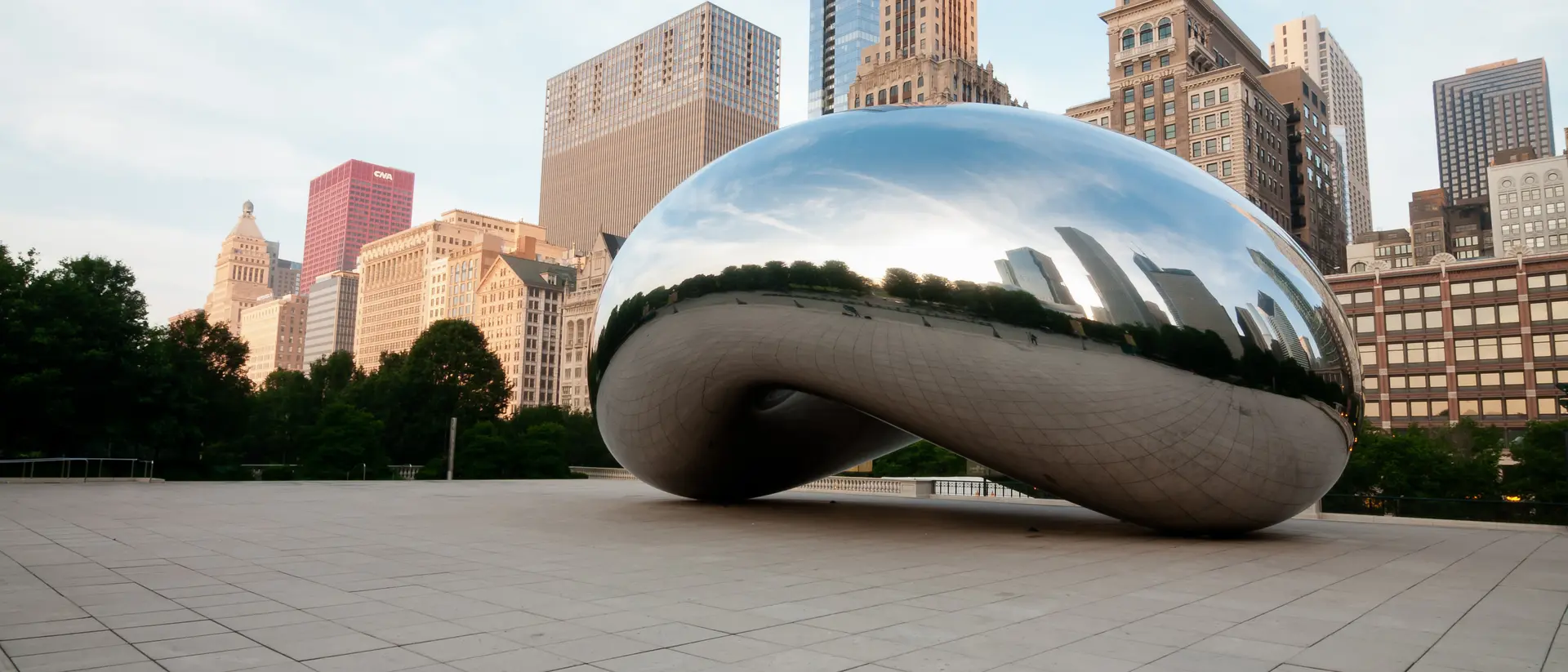 Illinois The Bean and Chicago skyline early in the day in Millennium Park just after sunrise