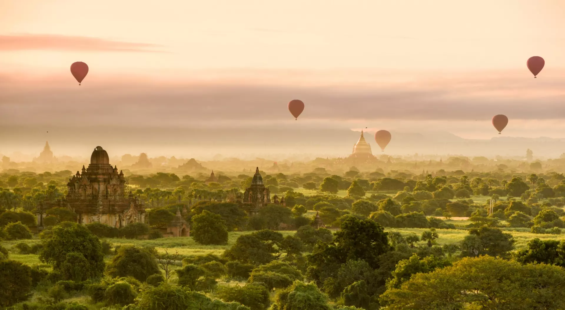 Bagan, Myanmar Hot air balloons dot the morning sky in Bagan, Myanmar