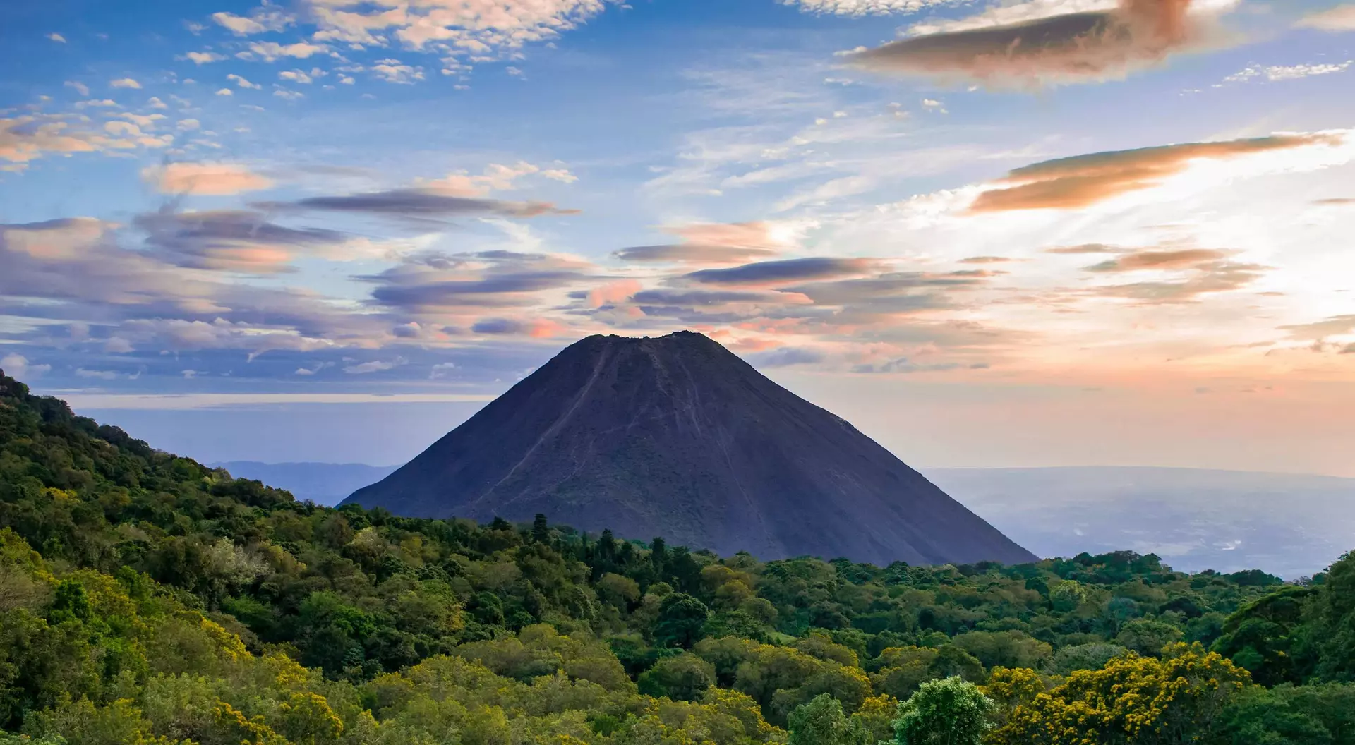 Izalco volcano rises up from the forest in El Salvador