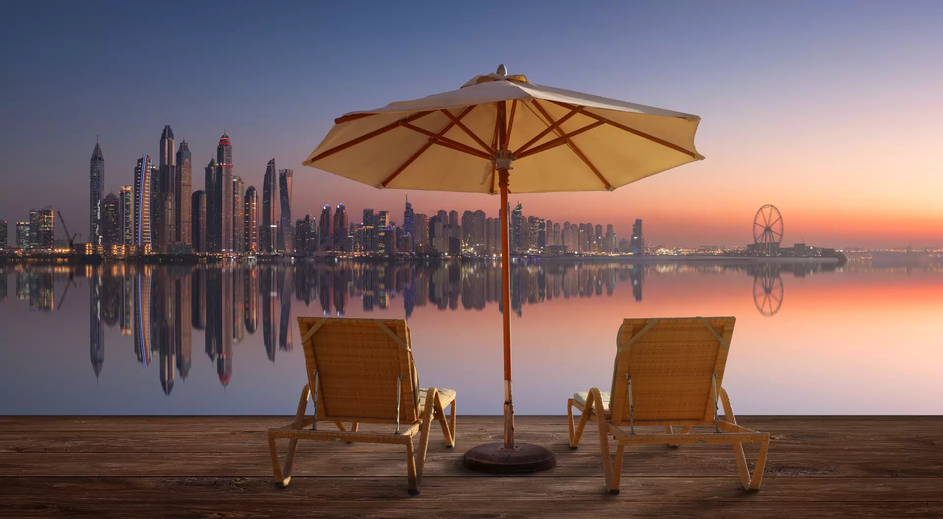 Beautiful beach in Dubai with the skyline of Dubai Marina on the horizon