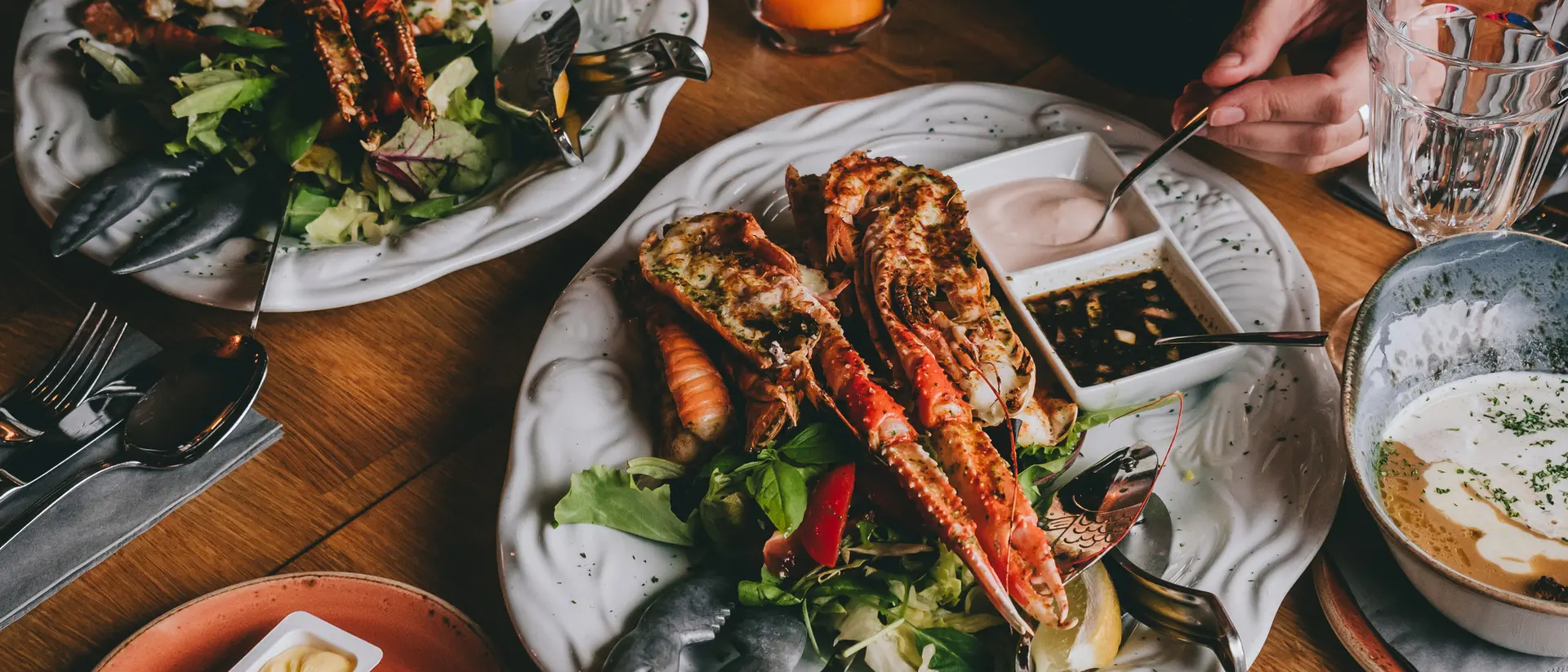 Langoustines on salad with sauces in restaurant in Hofn, Iceland