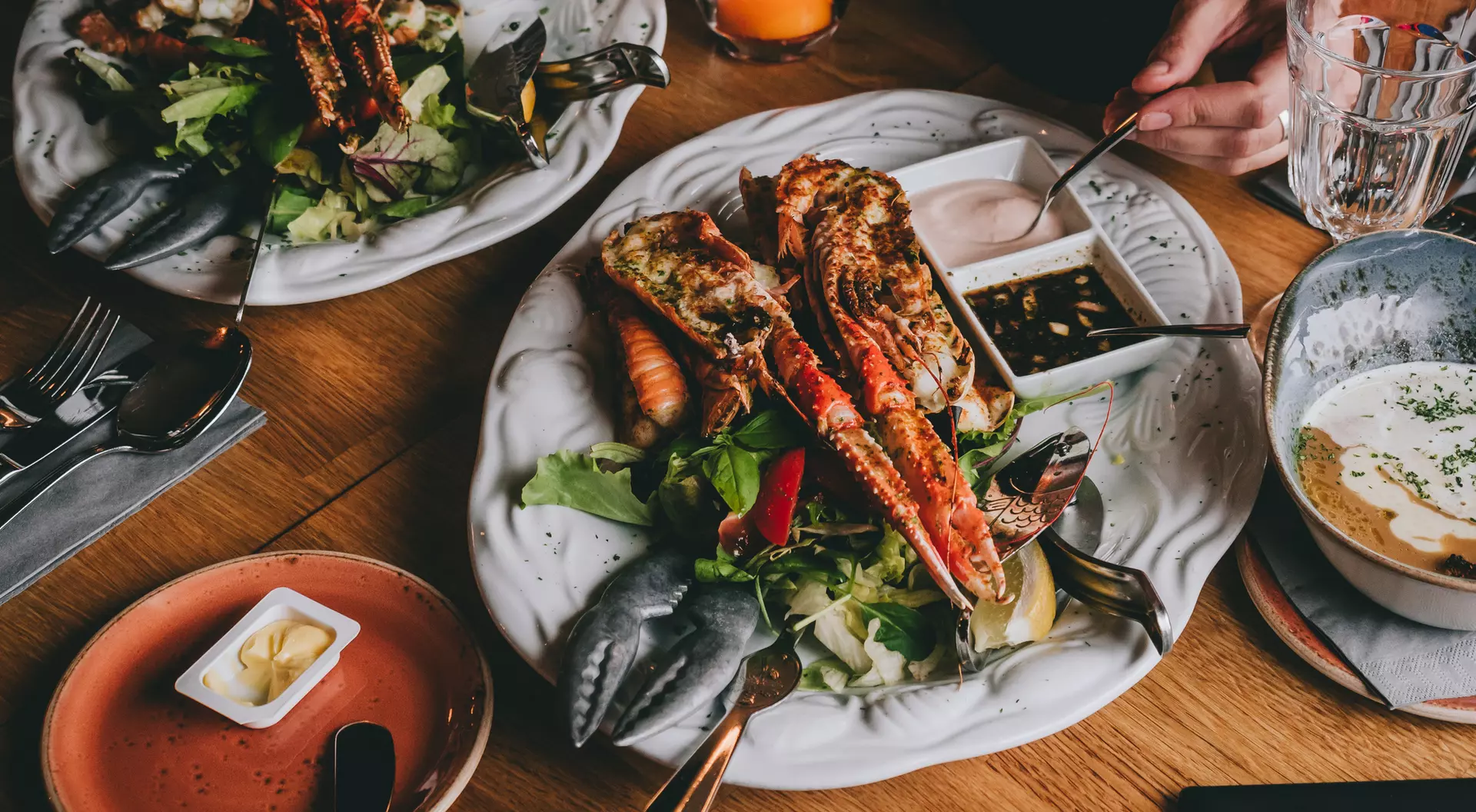 Langoustines on salad with sauces in restaurant in Hofn, Iceland