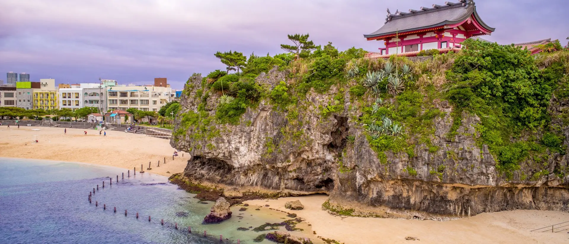 Japanese shrine on hill over breach and ocean