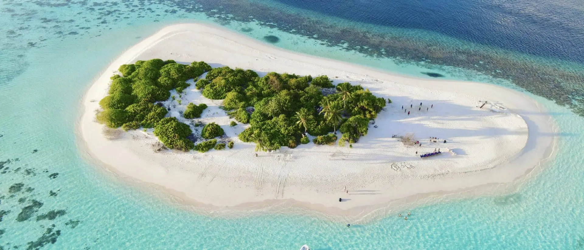 Aerial view of a white sand island in the morning